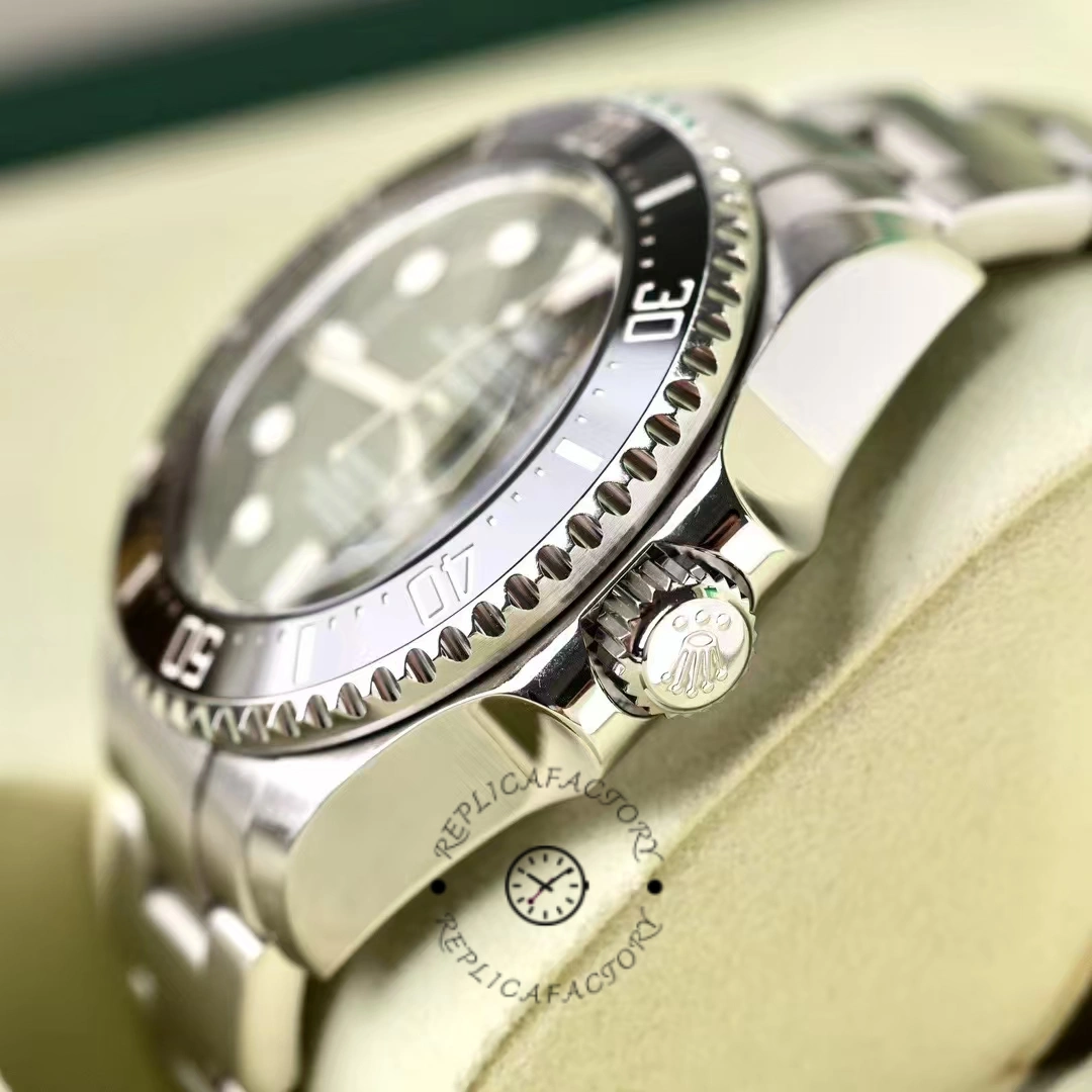 Side angle of the Rolex Sea-Dweller Deepsea 116660 showing bezel and crown detail.