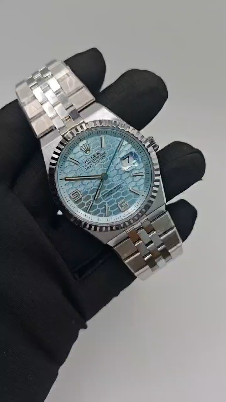 Video of Rolex Land-Dweller 36 M127236-0001 Replica showing ice blue dial and stainless steel bracelet.