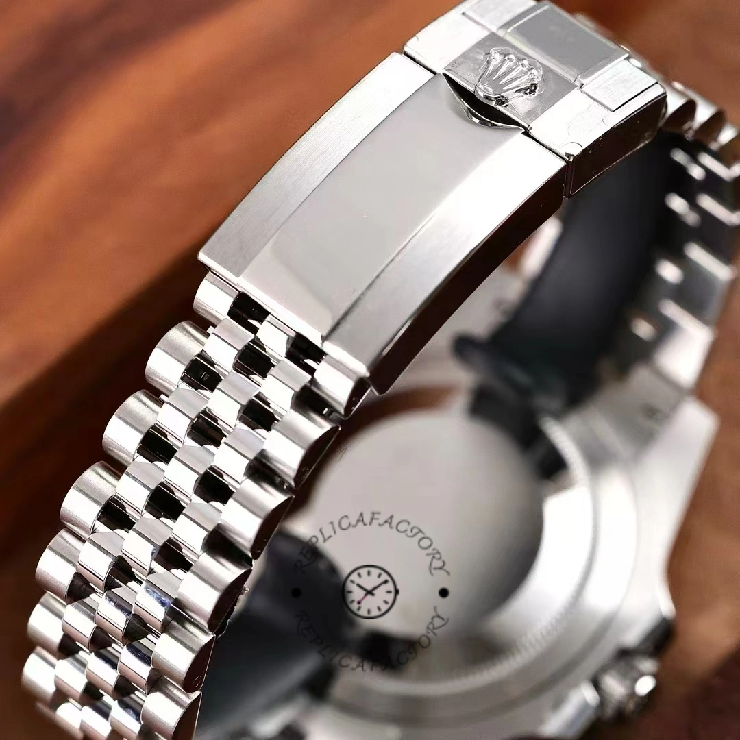 Rolex GMT-Master II M126710GRNR 0003, clasp and Jubilee bracelet close-up on wrist.