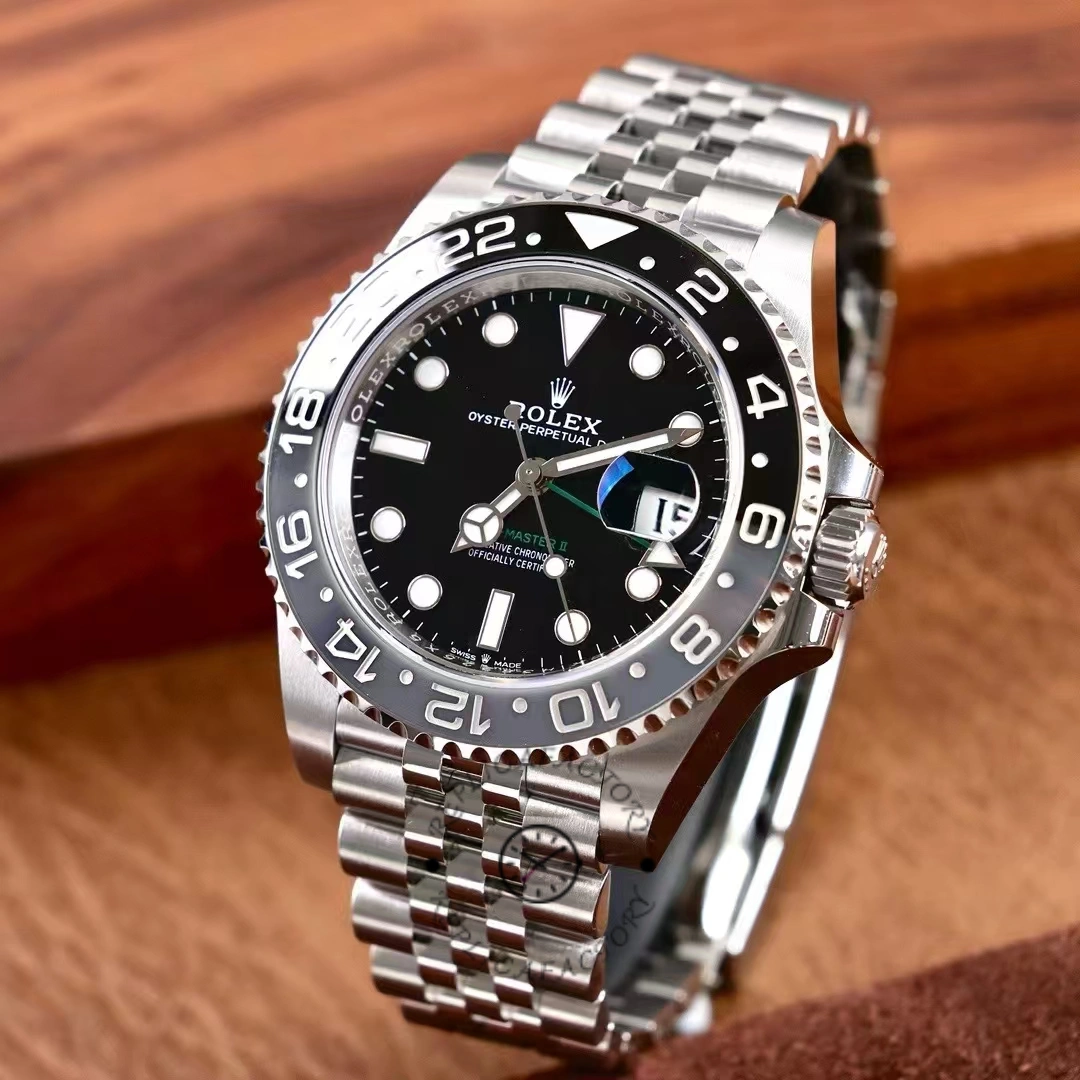 Rolex GMT-Master II M126710GRNR 0003, angled view showing bezel and Jubilee bracelet.
