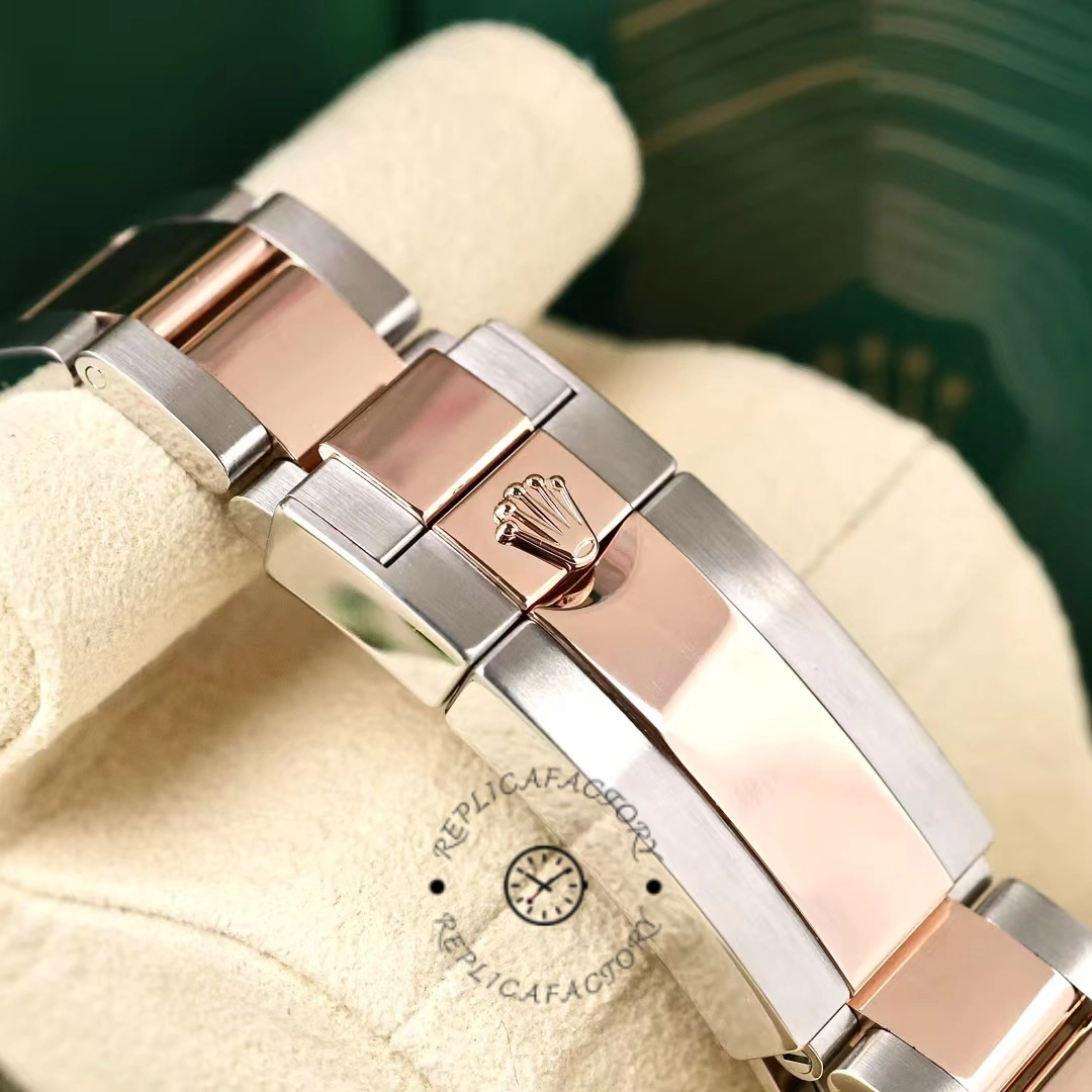 Clasp close-up of the Rolex Yacht-Master II 116681 showing two-tone Oyster clasp detail.