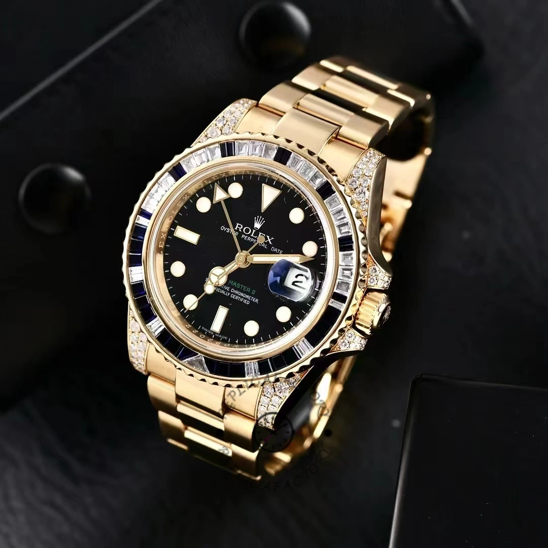 Top view of the Rolex GMT-Master II 116758 showing the full yellow gold bracelet and bezel.