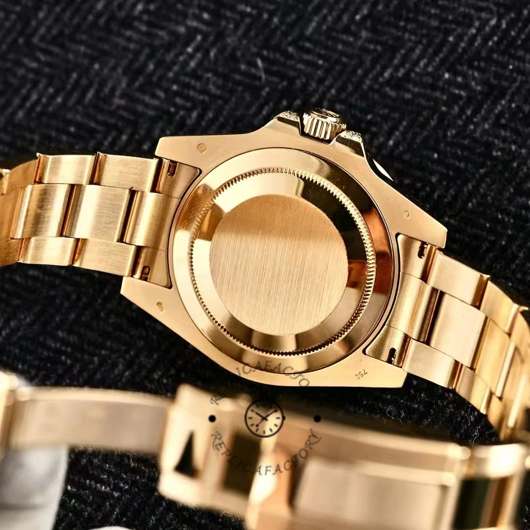 Caseback view of the Rolex GMT-Master II 116758 showing solid back and gold end links.