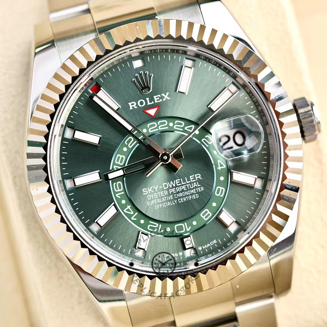 Close-up of green dial on Rolex Sky-Dweller 336934 with dual time and month display.