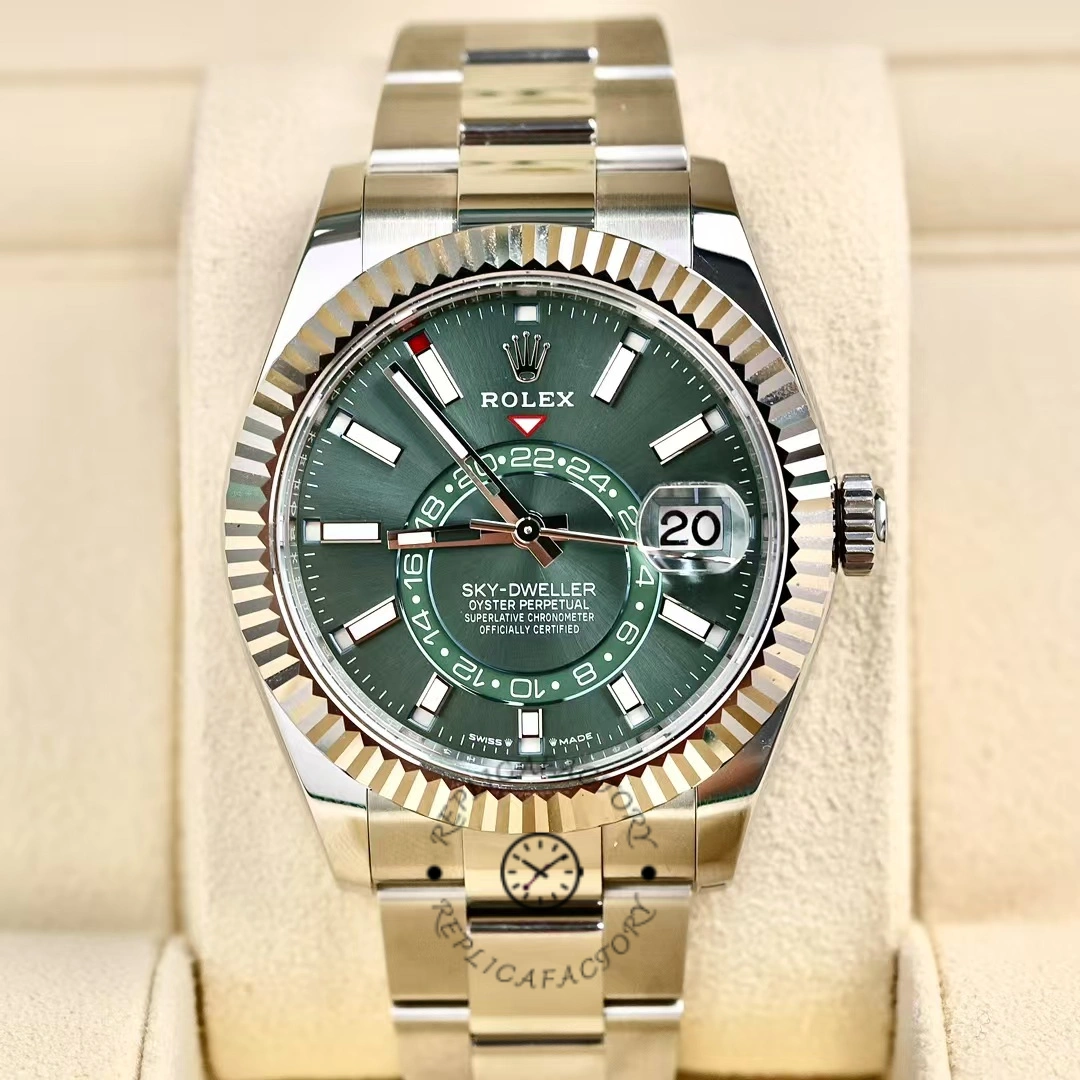 Rolex Sky-Dweller 336934 displayed with box, highlighting green dial and fluted bezel.