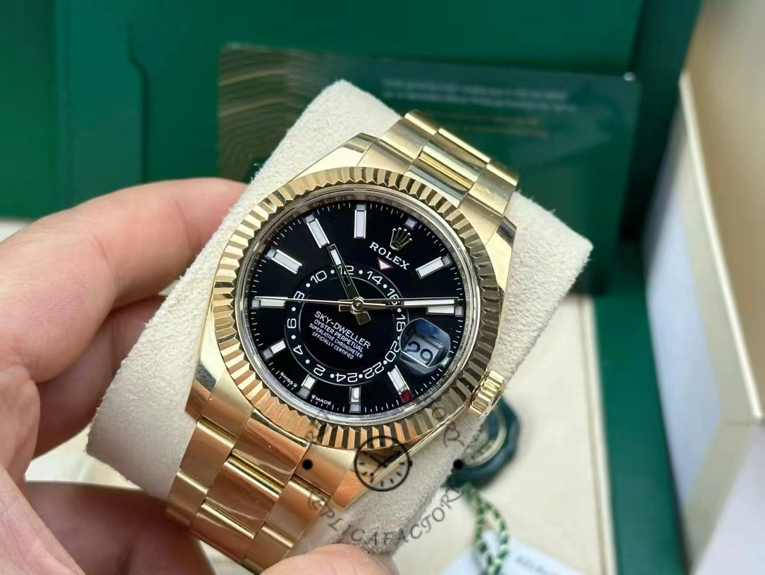 Rolex Sky-Dweller M336938-0002, angled wrist view showing fluted bezel and black dial.