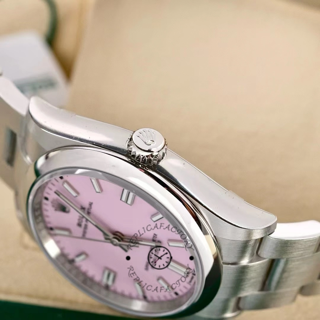 Rolex Oyster Perpetual 126000-0008, pink dial, side view showing case profile.