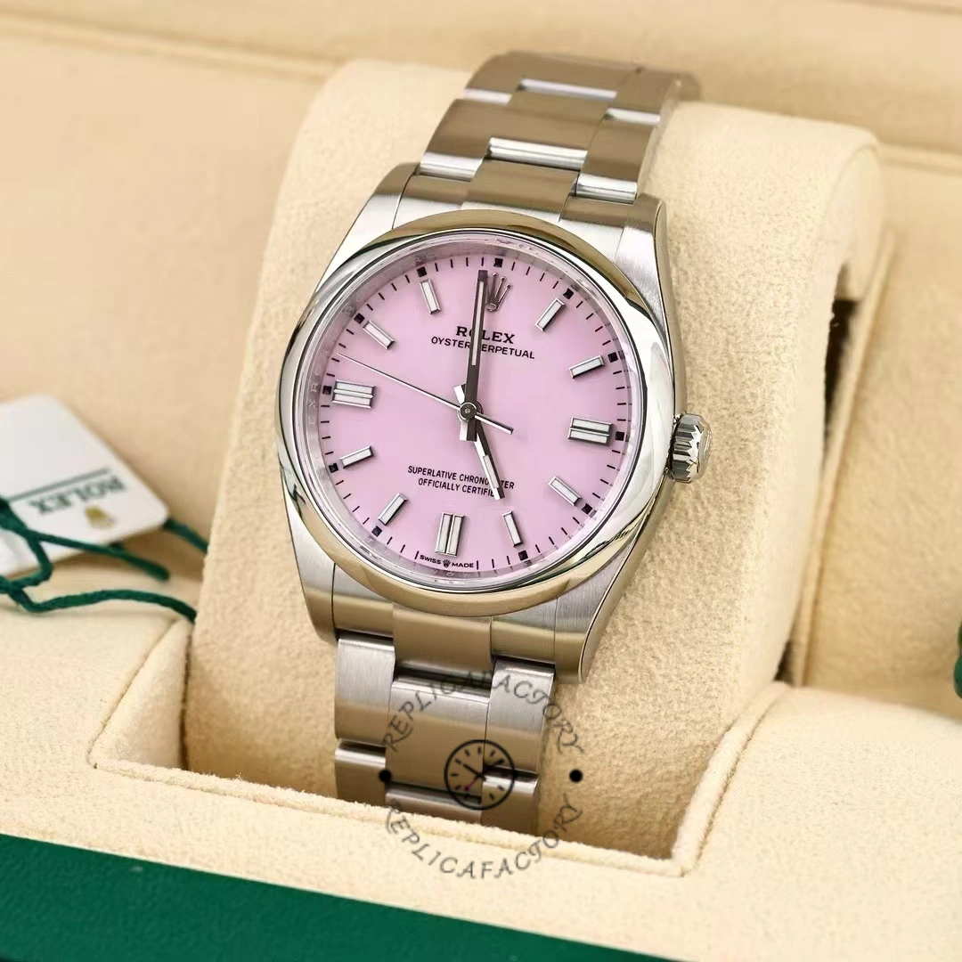 Rolex Oyster Perpetual 126000-0008, pink dial, close angled view in box.