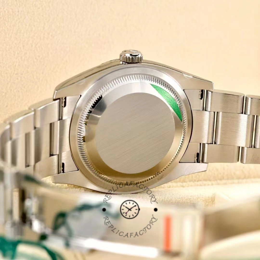 Rolex Oyster Perpetual 126000-0008, caseback view with protective sticker.