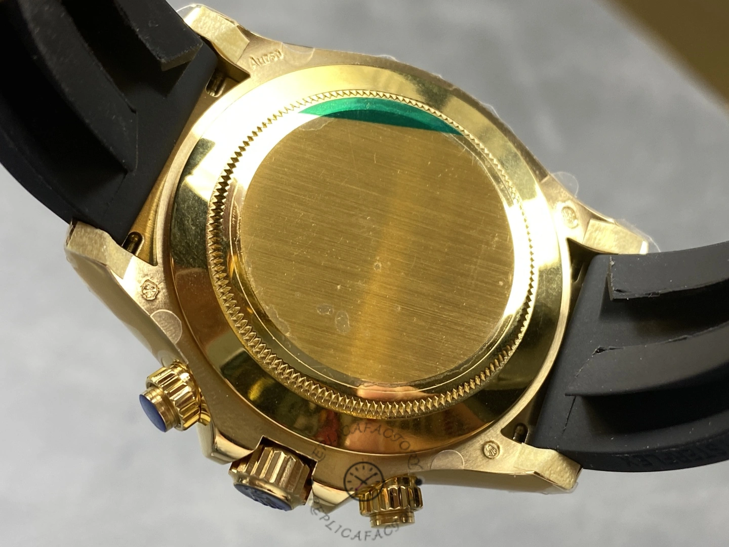 Rolex Daytona 126518LN 0016, caseback view showing the solid back and yellow gold chronograph case.