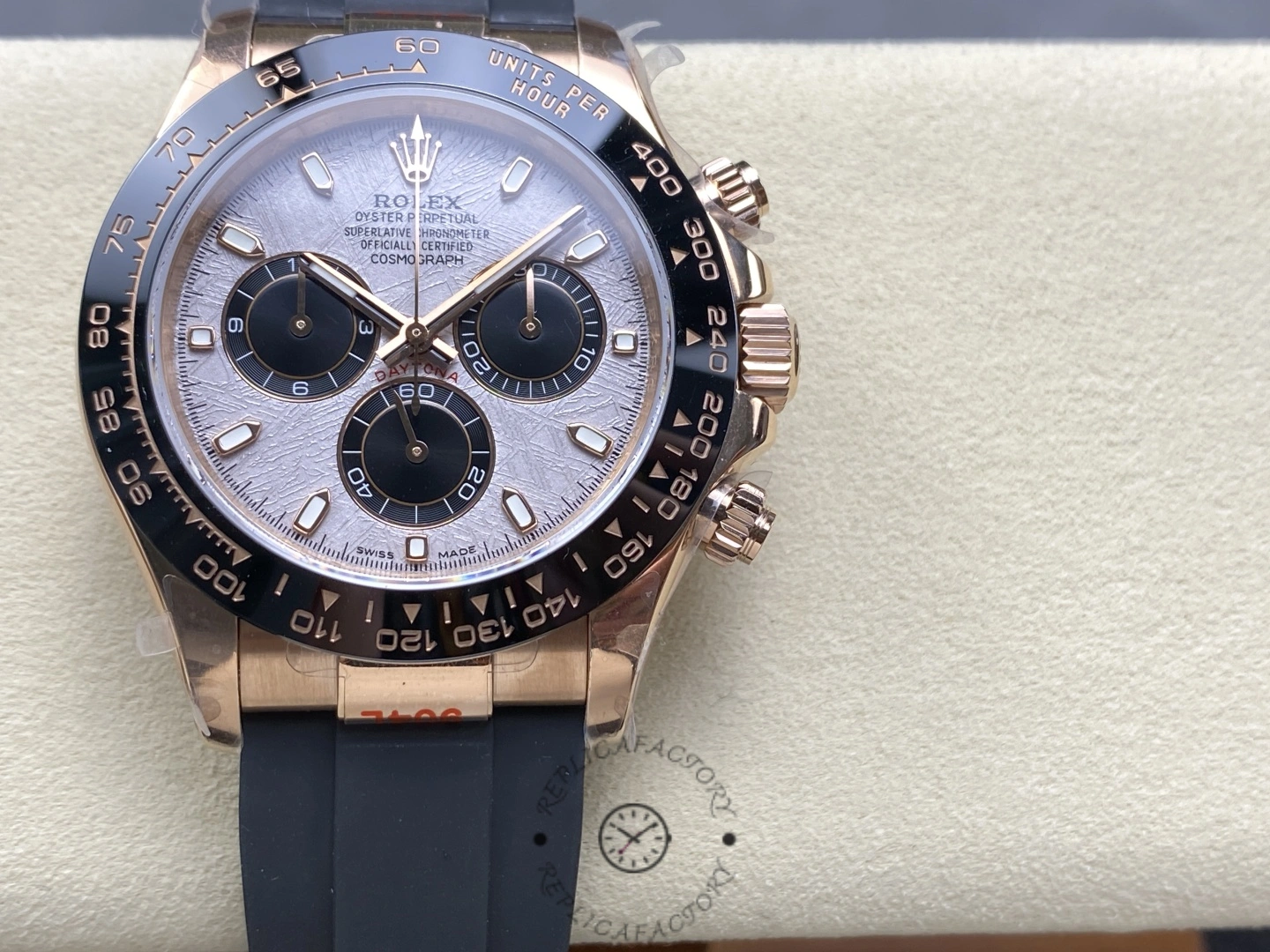 Rolex Daytona 126515LN-0008, watch displayed on cushion with Meteorite dial and black subdials.