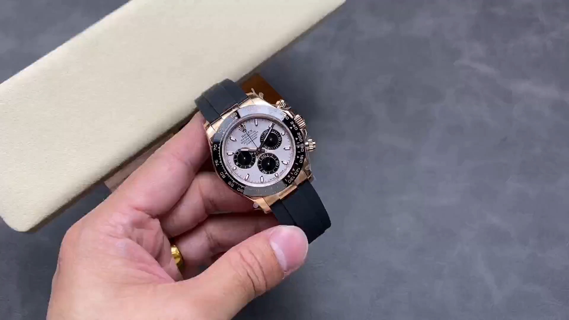Rolex Daytona 126515LN-0008, hand-held video showing the watch on black Oysterflex strap. - Video