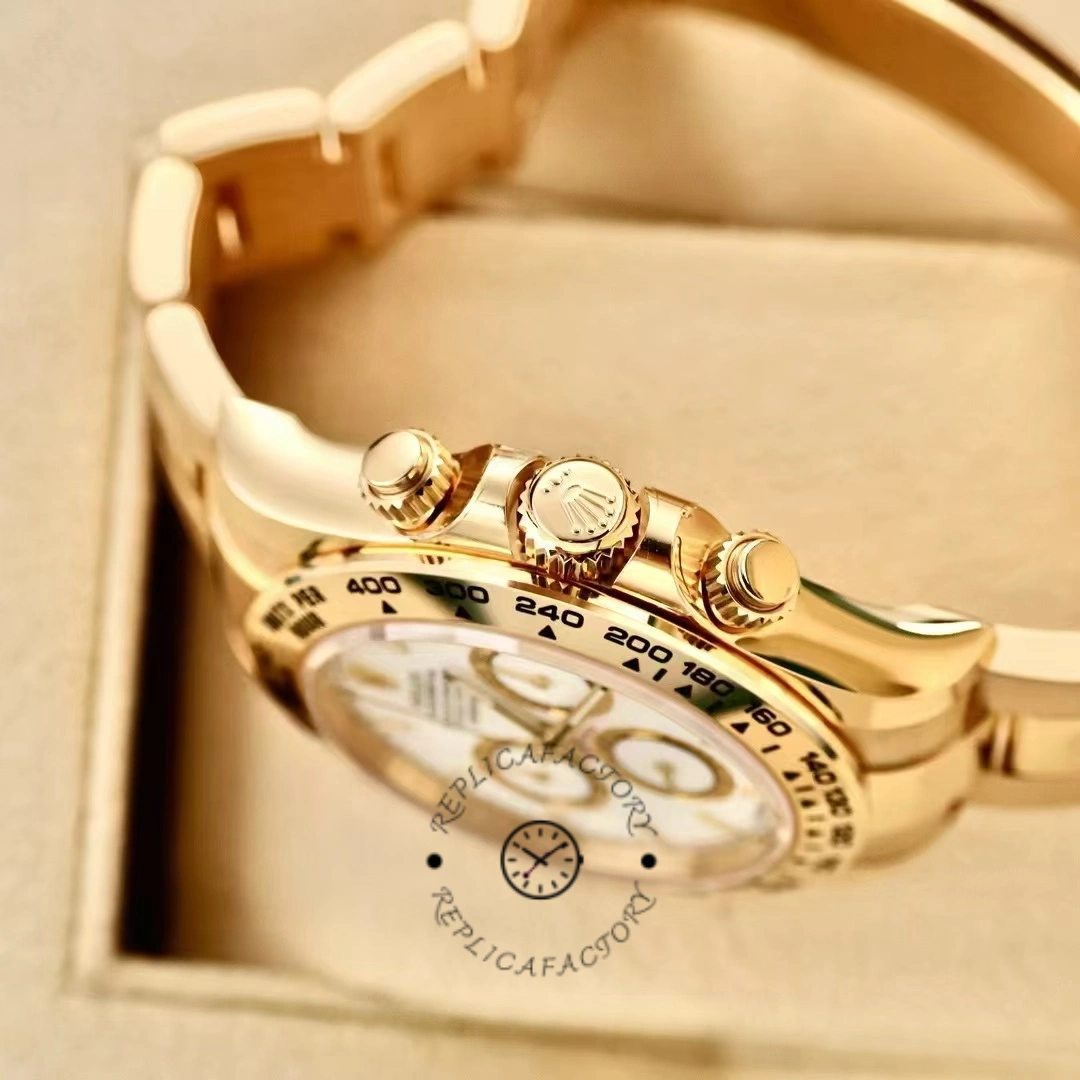 Top view of Rolex Daytona 126508-0001 on cushion showing white dial and gold crown.