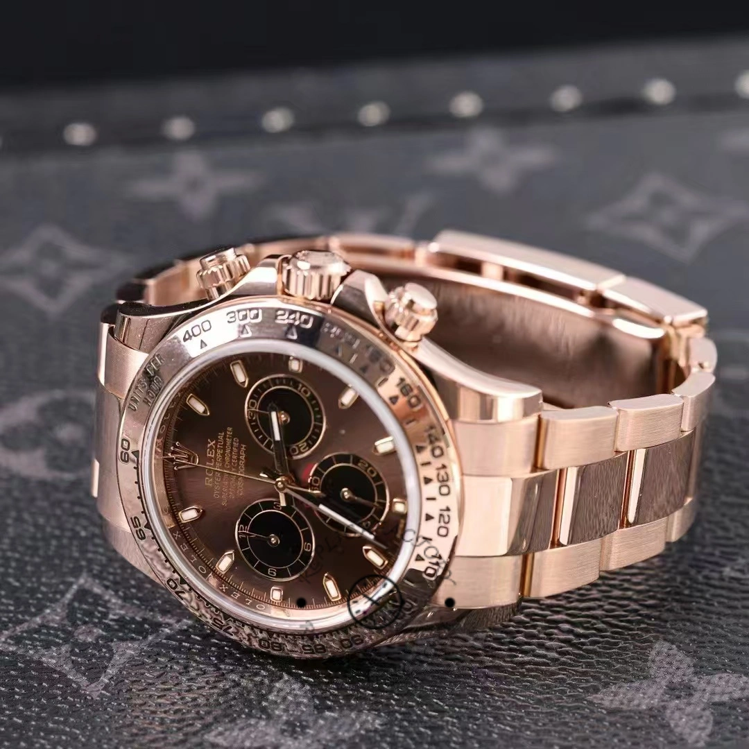 Rolex Daytona 116505 side-lying shot, showing case thickness and Everose crown side.