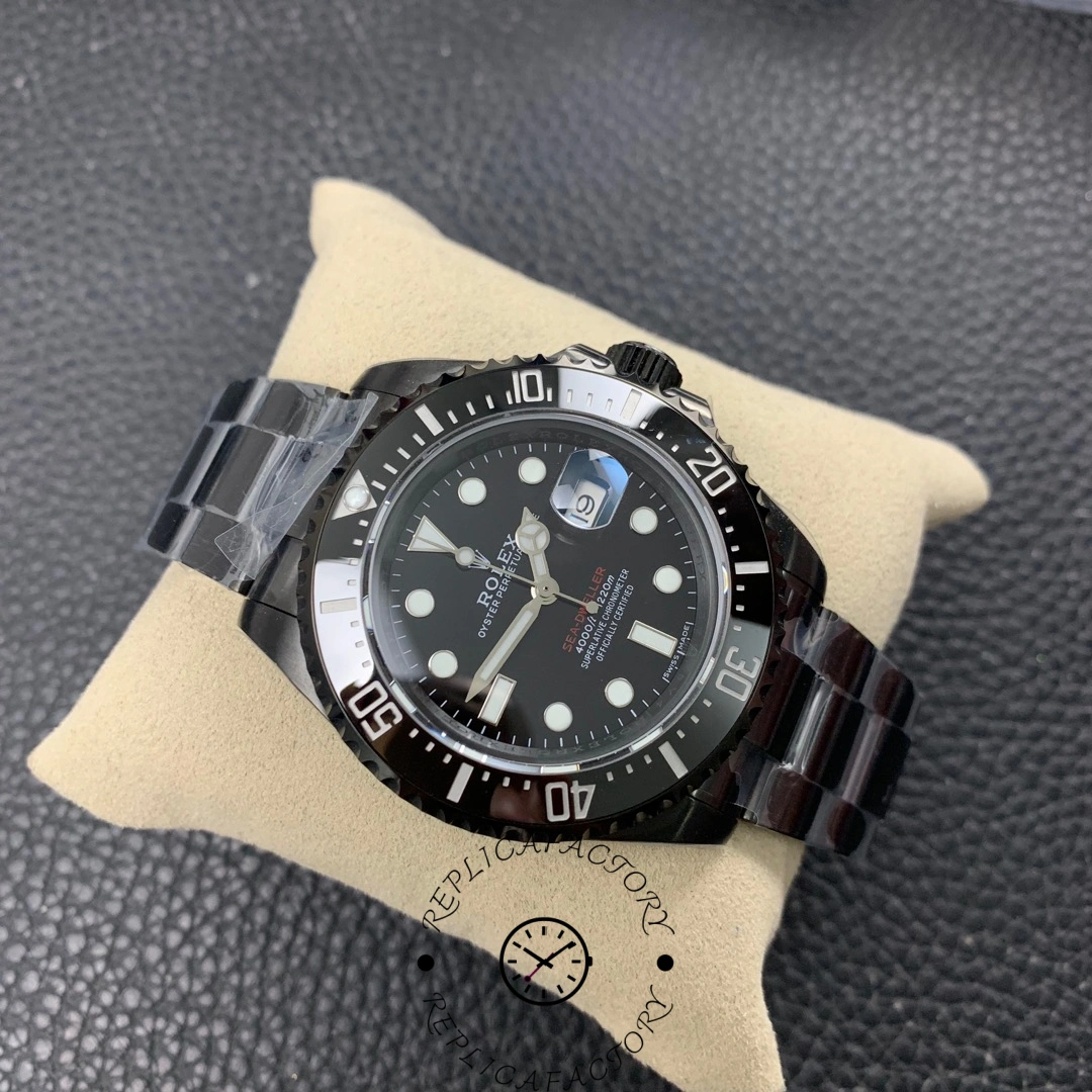 Angled view of Rolex Sea-Dweller Deepsea 126660 on cushion, showing case and bracelet.