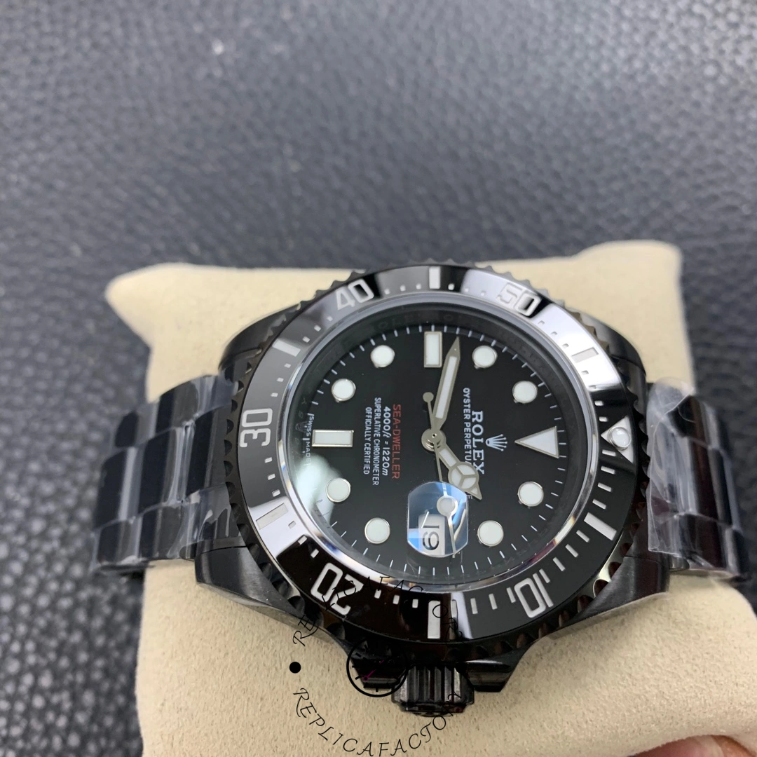 Close-up of Rolex Sea-Dweller Deepsea 126660 dial, luminous markers and hands.