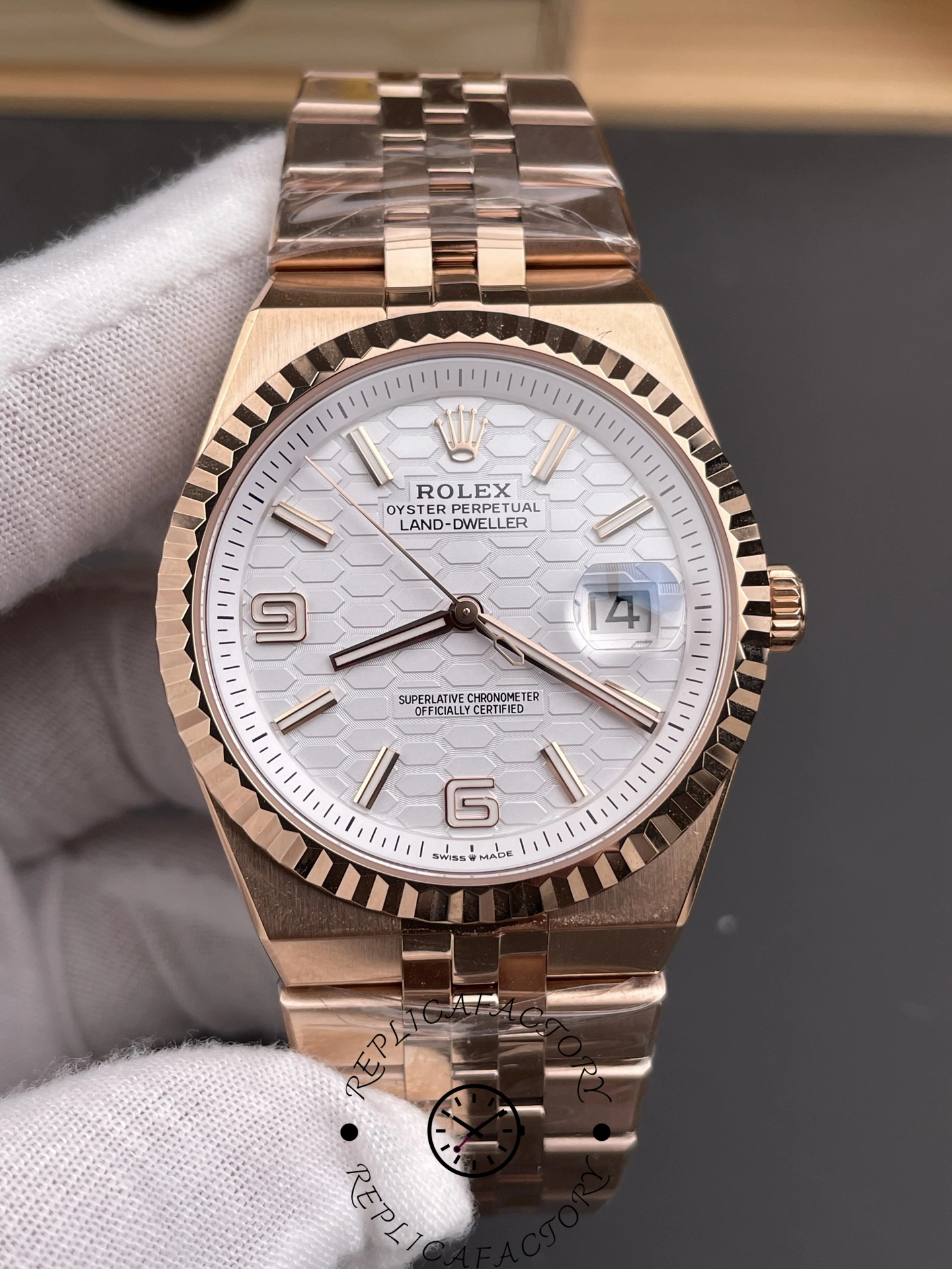 Close-up front shot of Rolex Land-Dweller M127235-0001 Replica showing cyclops date window and dial texture.