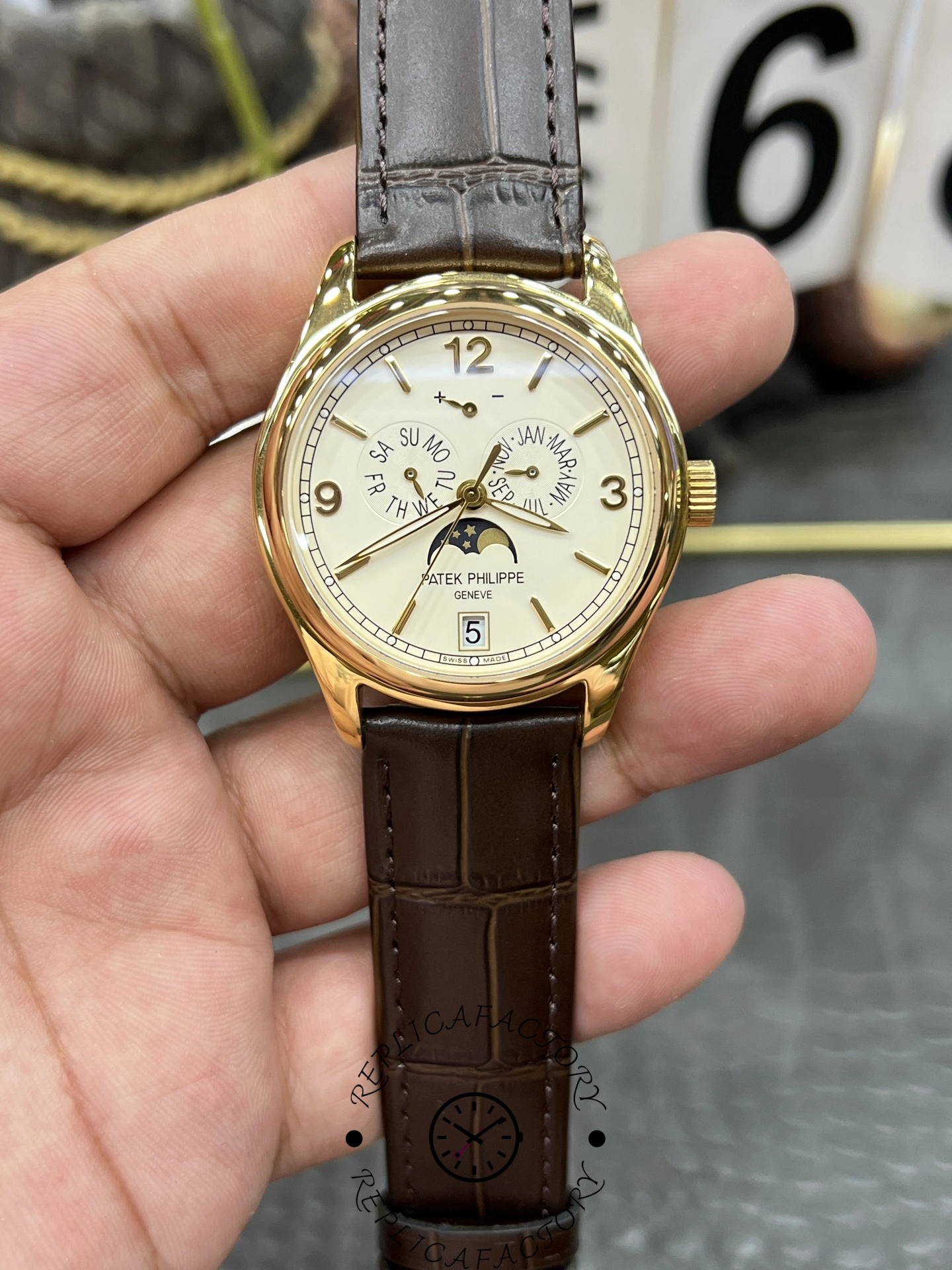 Patek Philippe 5146R-001 on strap, clear view of annual calendar subdials and moonphase window.