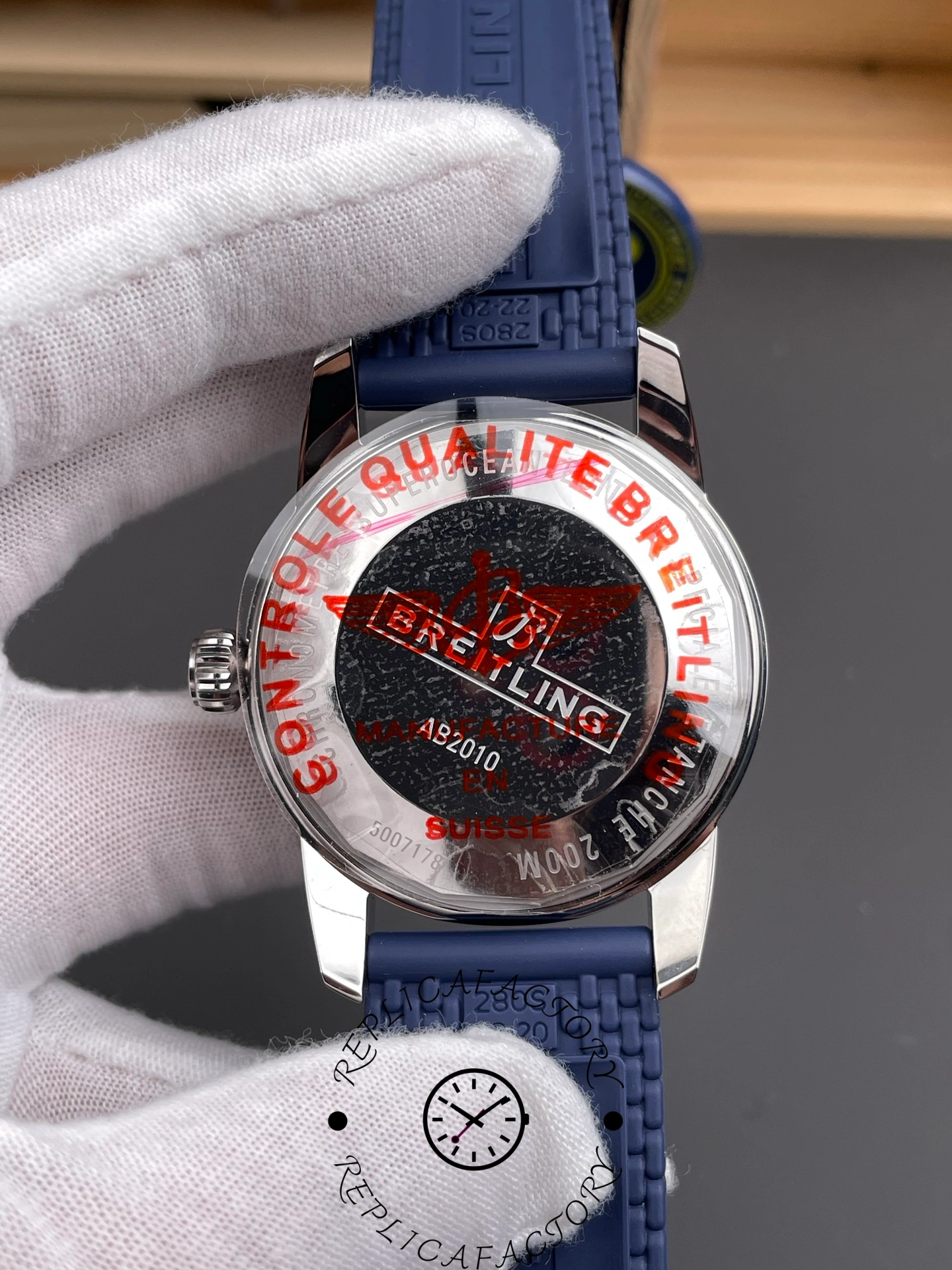 Breitling Superocean Heritage B31 44 UB3112161C1S1, caseback view showing rotor and engravings.