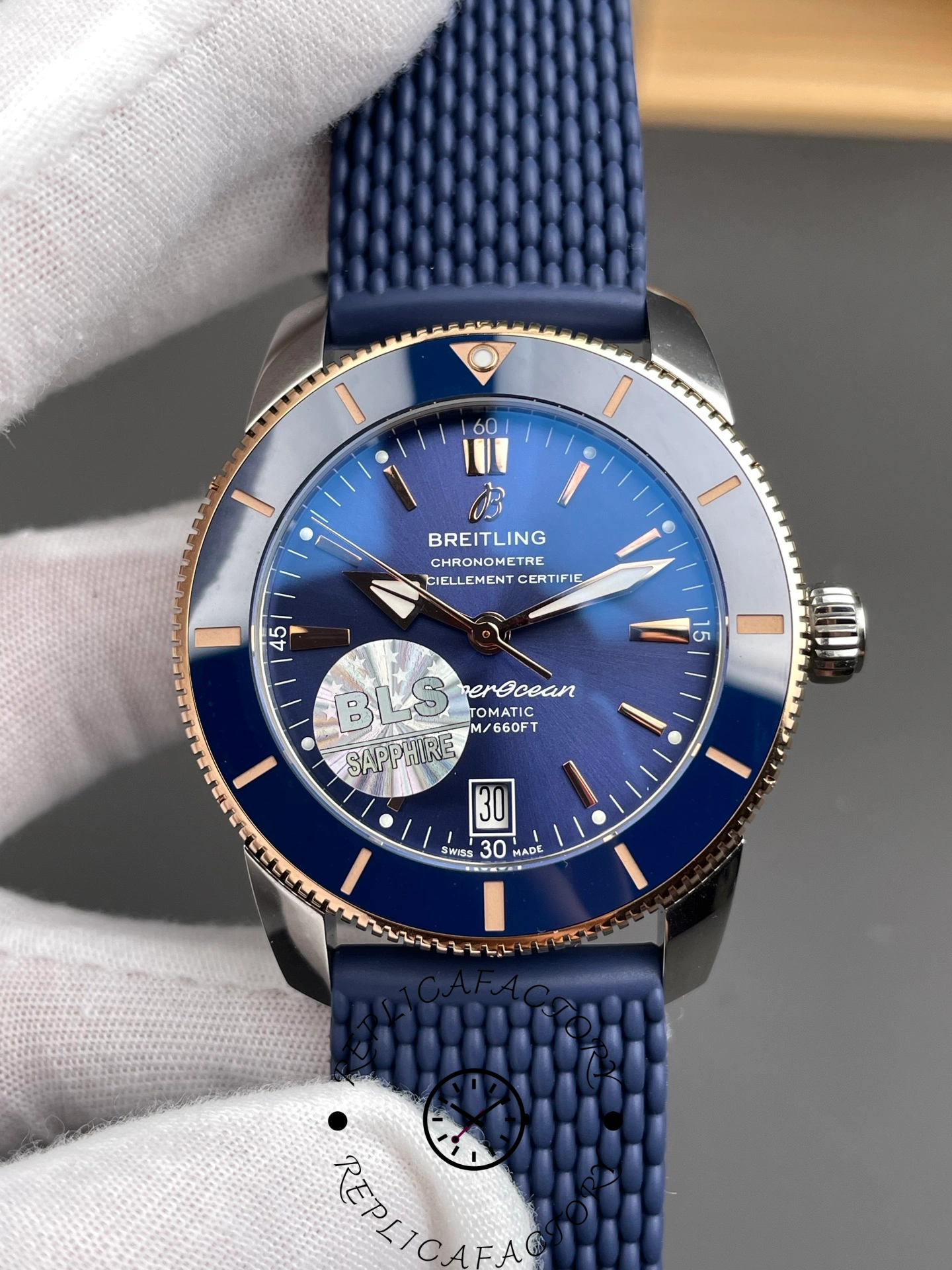 Breitling UB3112161C1S1, front view dial shot emphasizing sunburst texture and applied indexes.