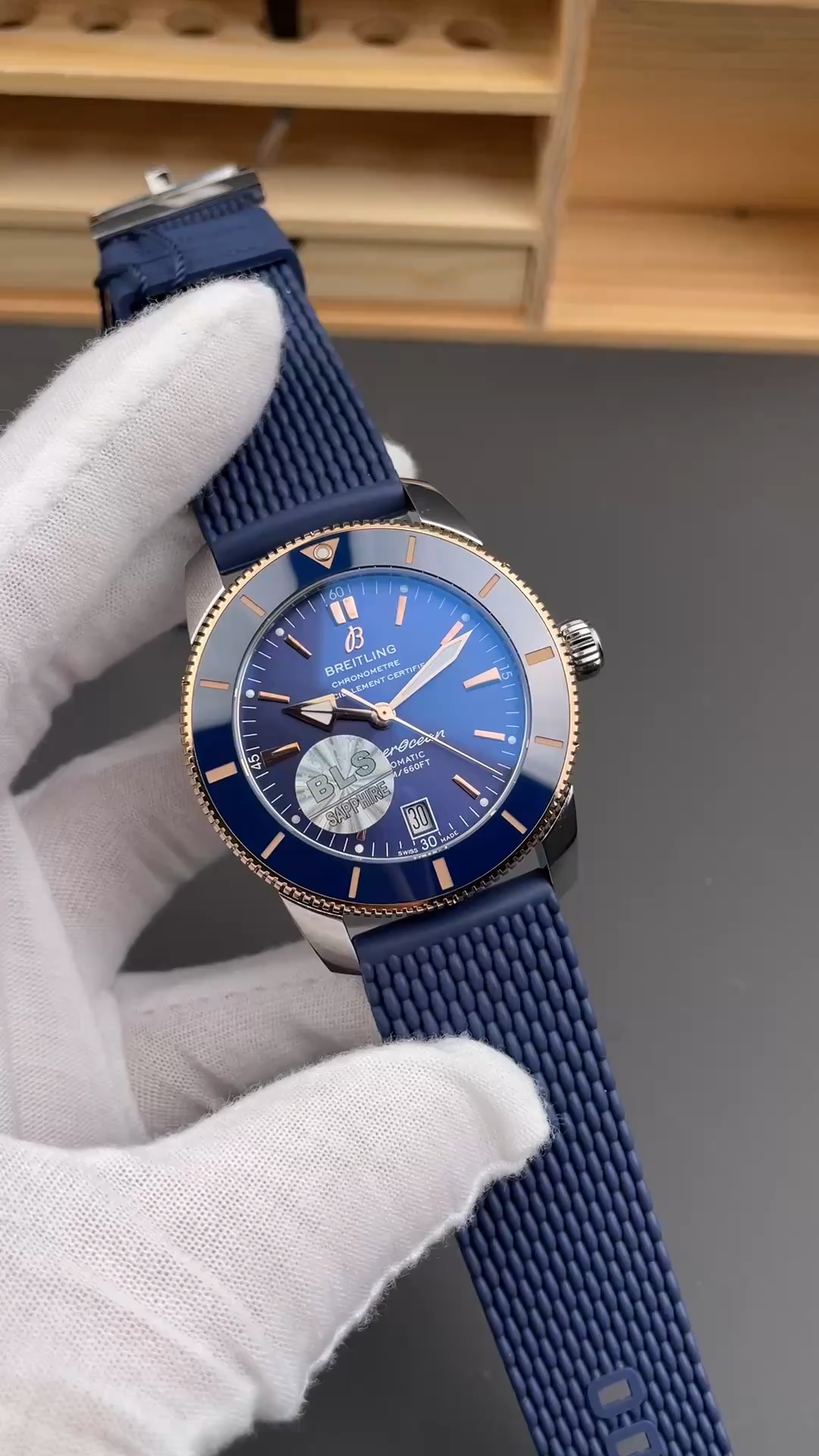 Breitling Superocean Heritage B31 44 UB3112161C1S1, video showing dial and blue strap, on cushion. - Video