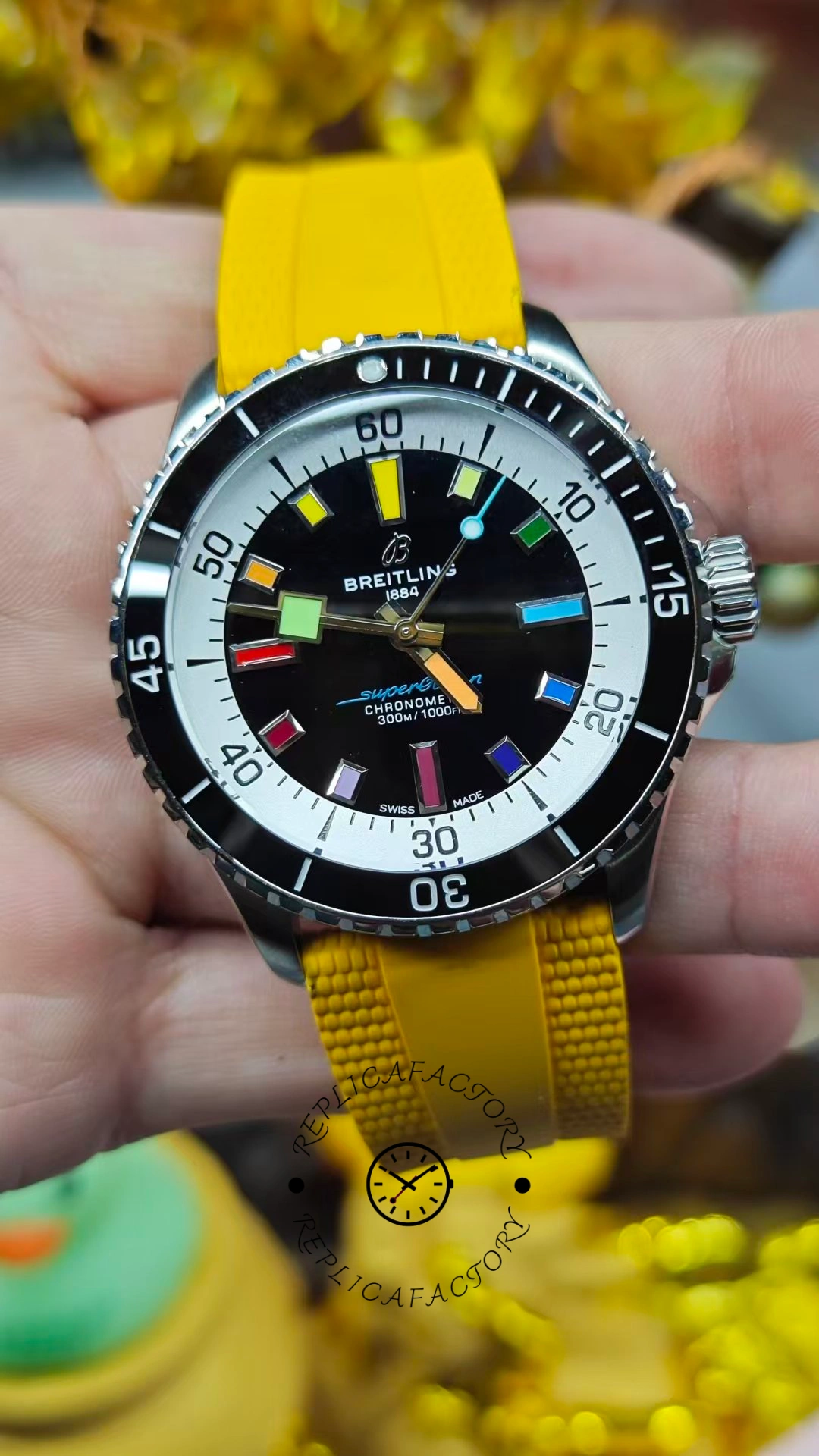 Outdoor wrist-style shot of Breitling Superocean Automatic A17375211B2S4 highlighting bezel and minute ring.