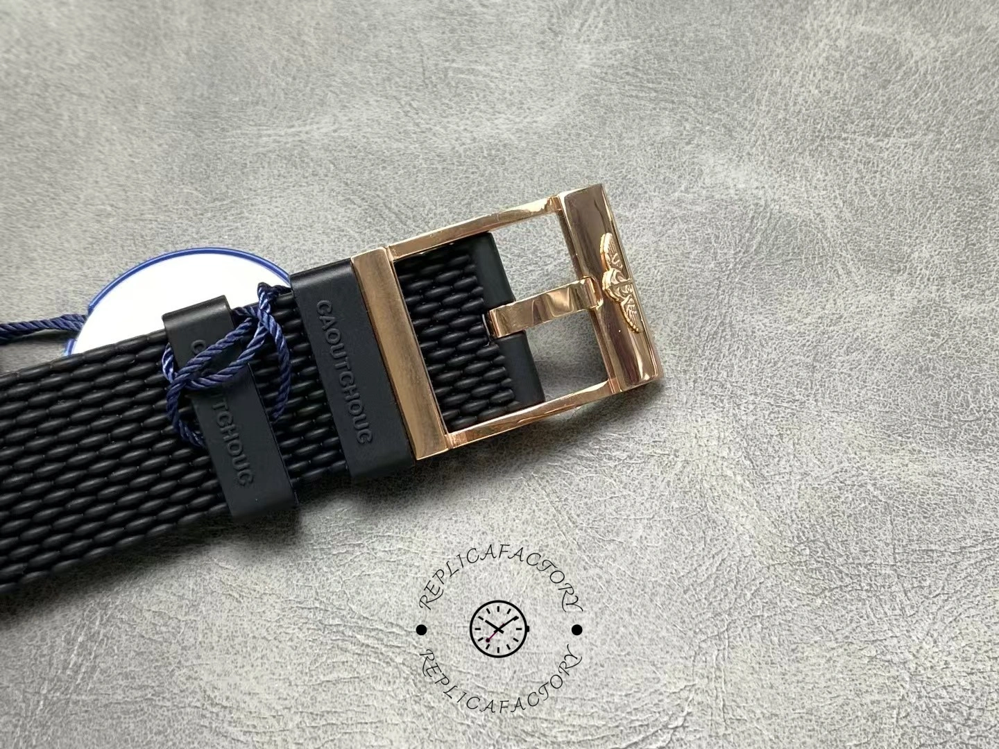 Breitling RB2010121B1S1, strap and buckle laid flat showing clasp shape and strap end.