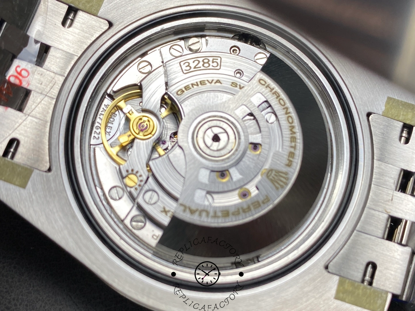 Rolex GMT-Master II 126710BLNR open case back, movement rotor and mechanism close-up.