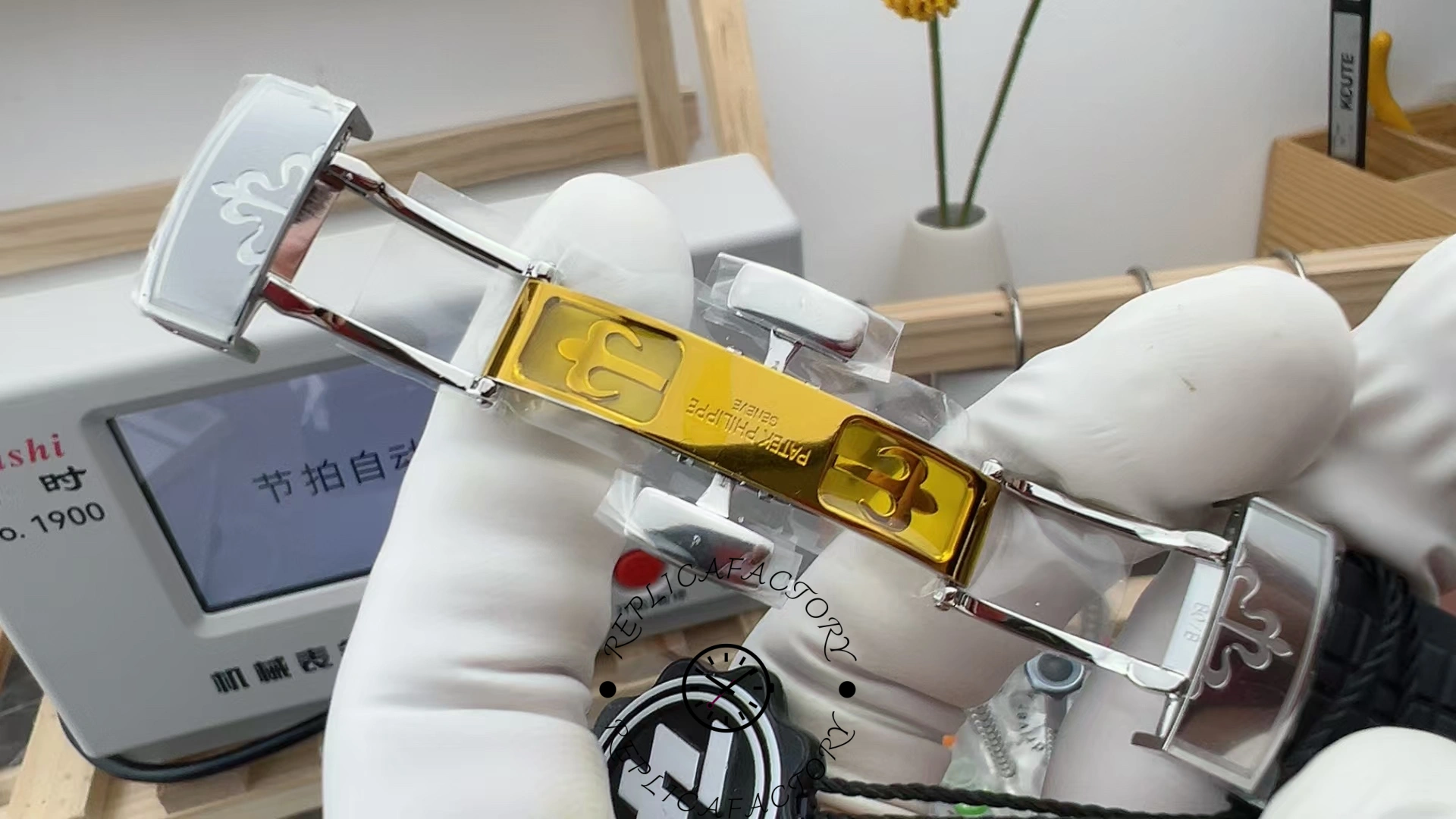 A diagram of the unfolded clasp of the Patek Philippe Aquanaut 5164A-001, covered with a thin film.