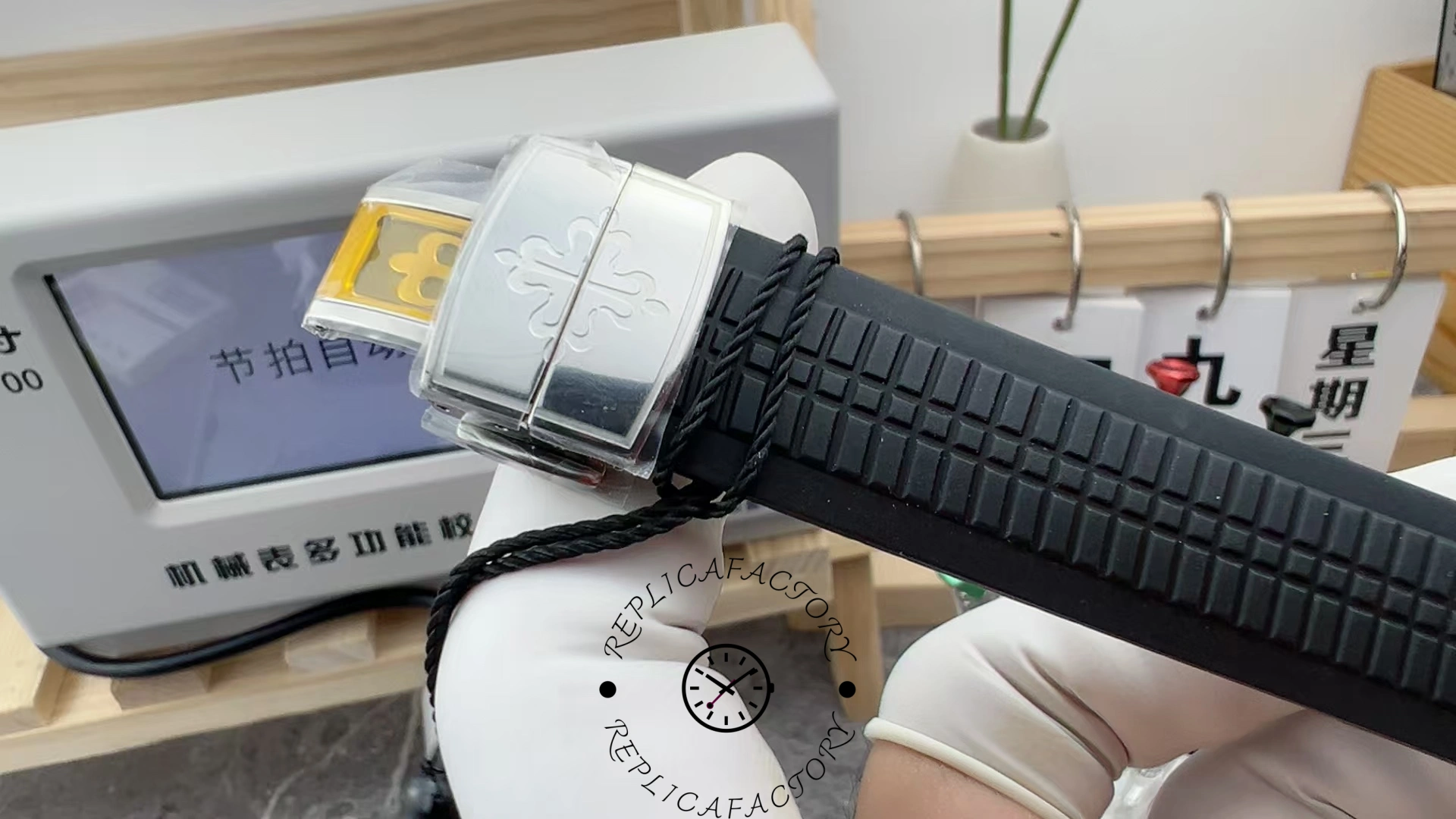 Strap and clasp view of the Patek Philippe Aquanaut 5164A-001, showing the rubber strap texture.