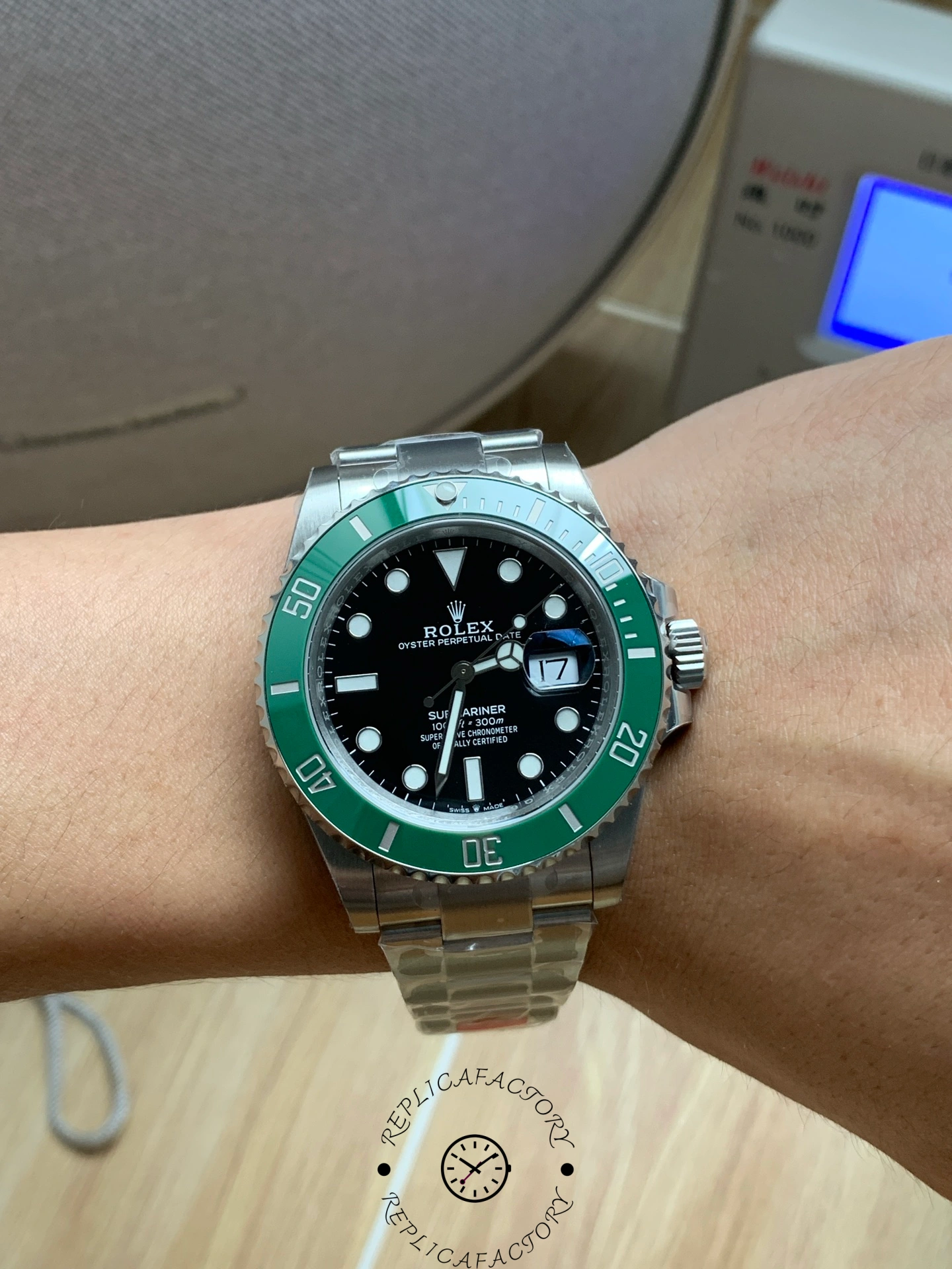 Rolex Submariner 126610LV, wrist shot showing green bezel and black dial proportions.