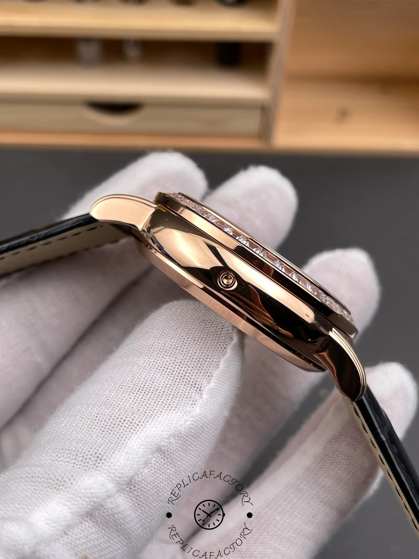 Side profile of Patek Philippe 6104R 001 showing case thickness and curved lugs.