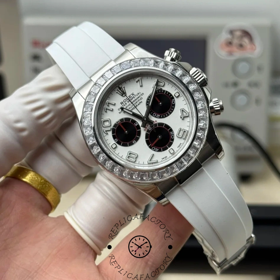 Rolex Daytona 116519, angled view showing chronograph pushers and white rubber strap.