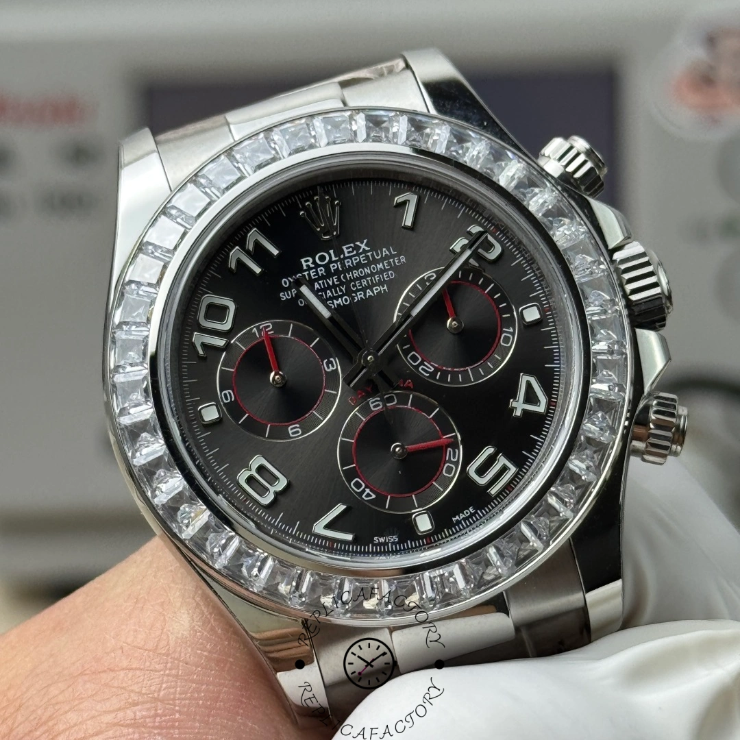 Rolex Daytona 116519, close-up of black dial with chronograph subdials and markers.