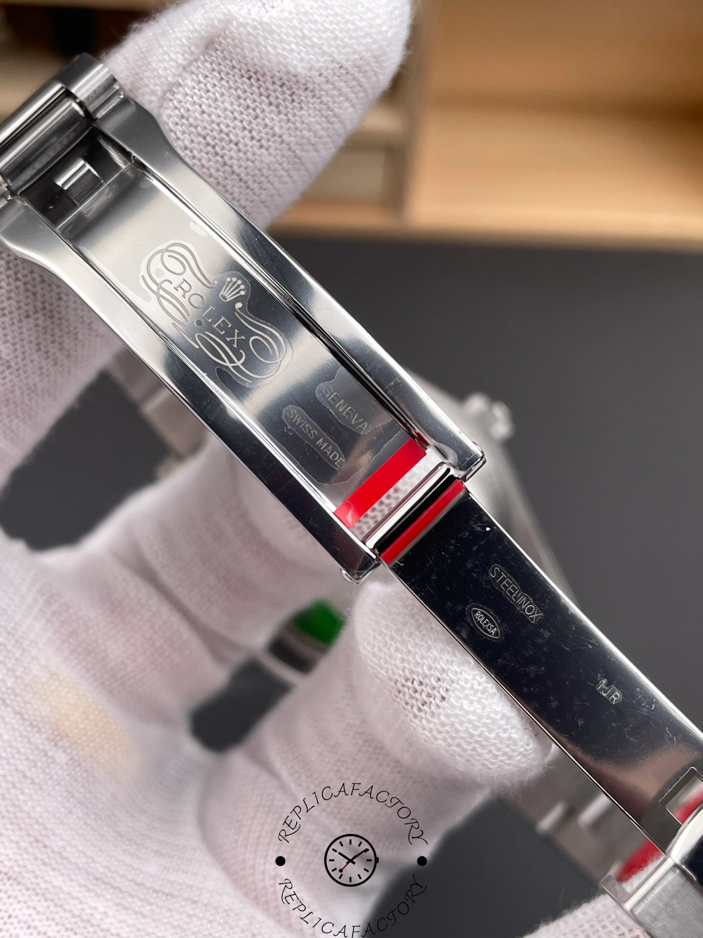 Rolex Milgauss 116400GV, clasp close-up showing folding clasp detail and adjustment area.