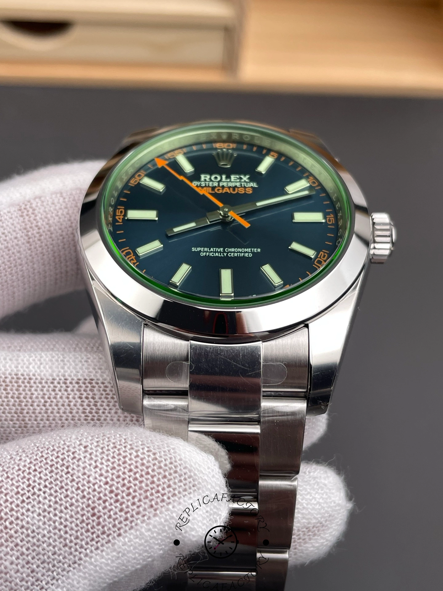 Rolex Milgauss 116400GV, dial close-up showing Z-blue sunburst finish and lightning seconds hand.
