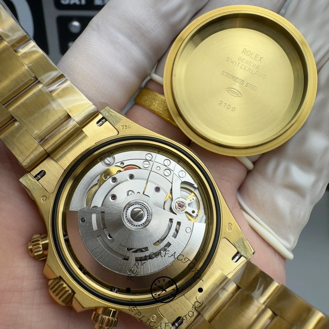 Rolex Daytona 116568BR open caseback view, showing movement inside yellow gold case.