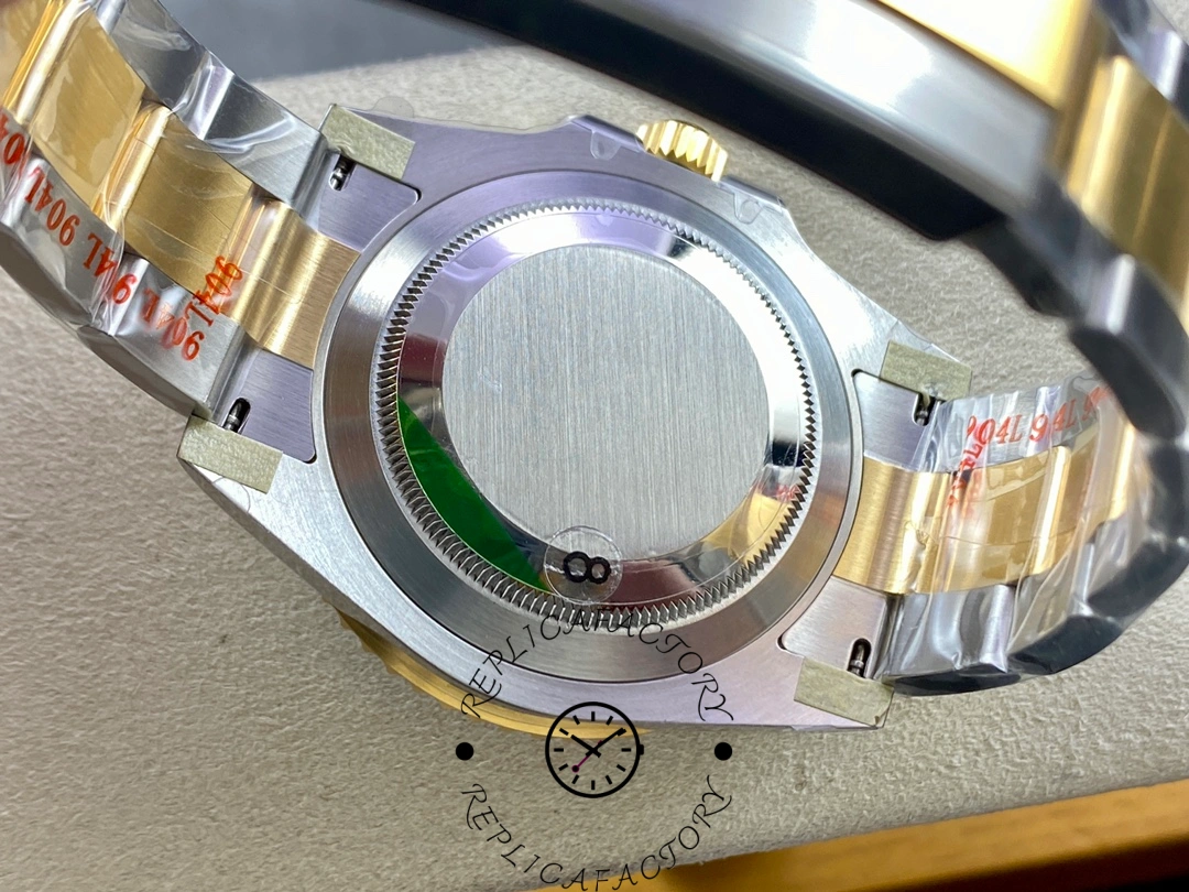 Rolex Submariner 126613LB caseback view, two-tone bracelet and solid back cover shown.