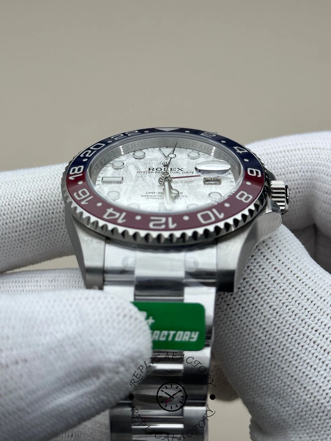 Rolex GMT-Master II 126719 0002 side angle, case profile and bezel edge, in glove.