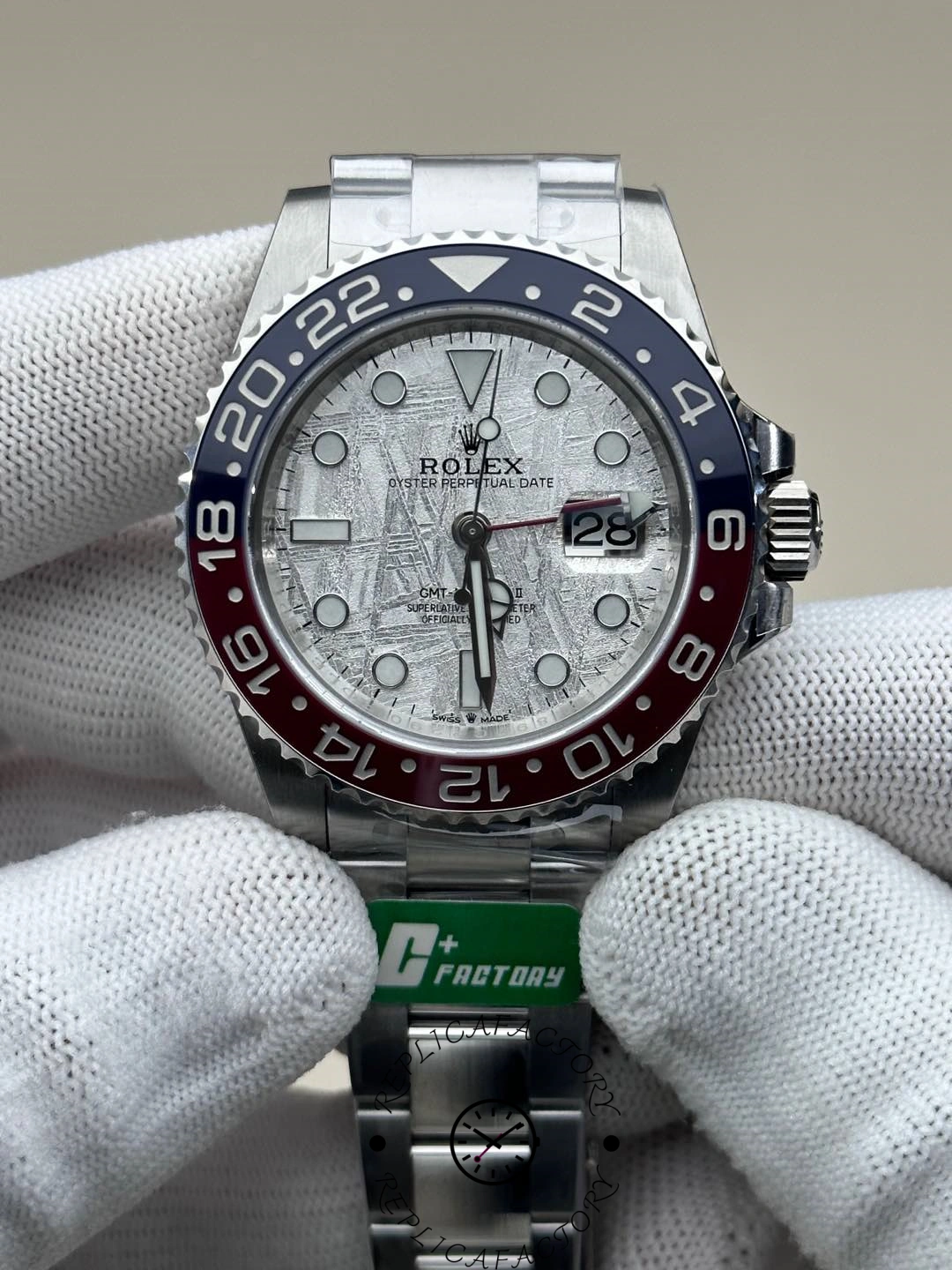 Rolex GMT-Master II 126719 0002 macro front view, meteorite dial markers and hands.