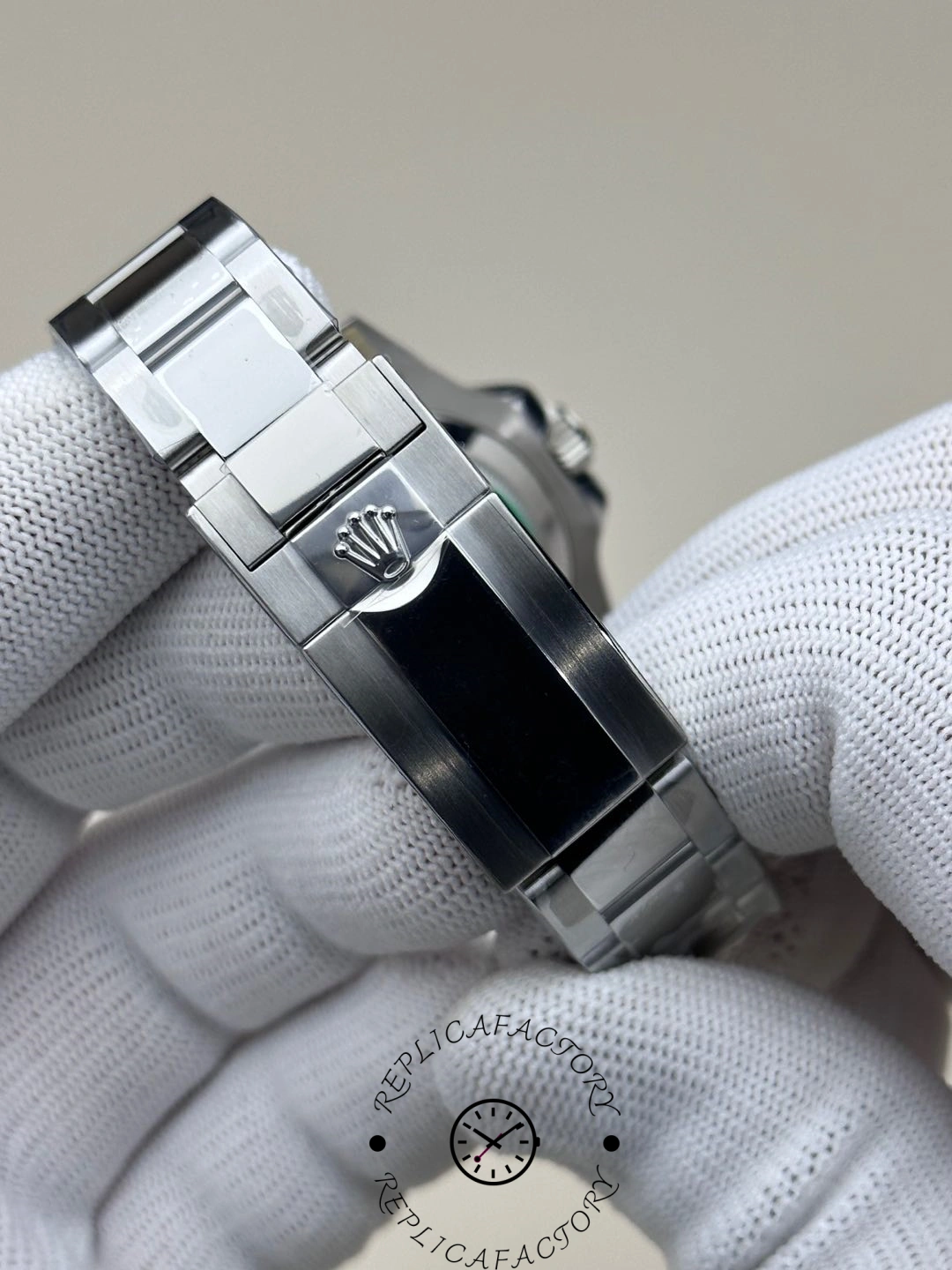 Rolex GMT-Master II 126719 0002 bracelet underside view, links and clasp, held in glove.