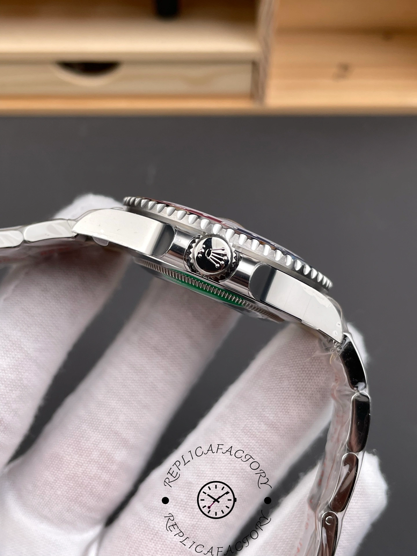 Rolex GMT-Master II 126719 0002 crown-side view, case profile and bracelet end links.