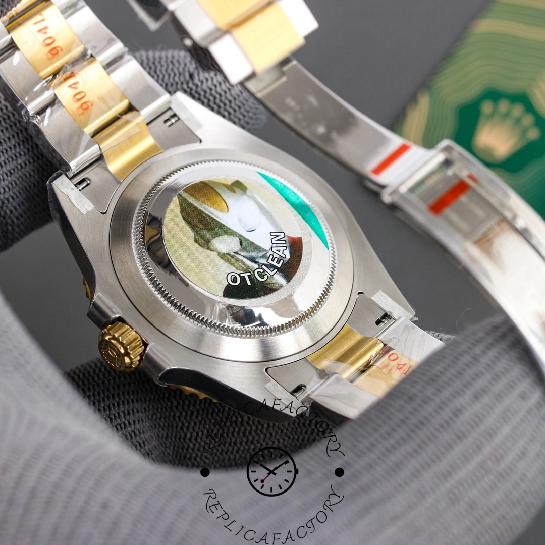 Rolex Submariner 126613LN 0002 caseback close-up with protective sticker and serial area.