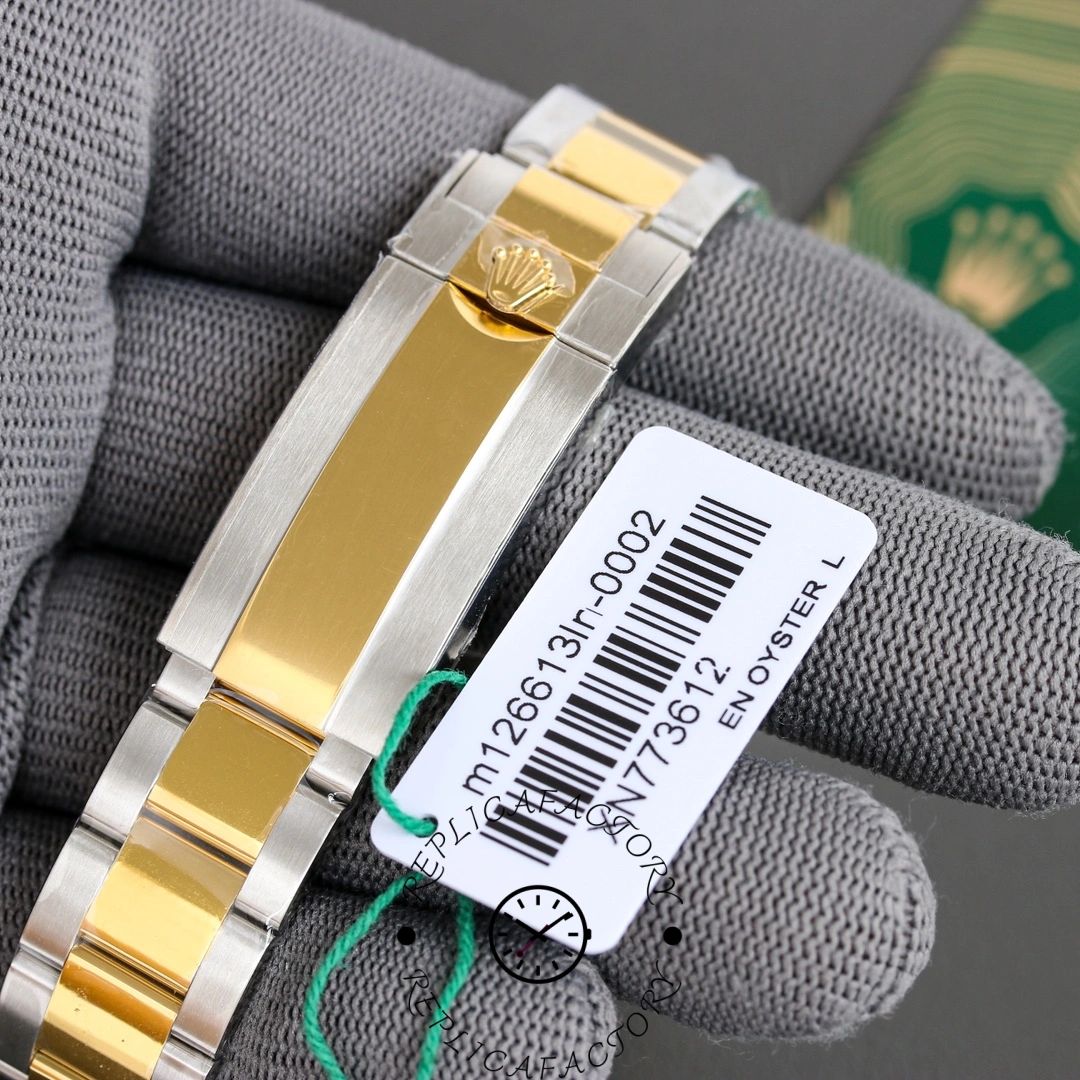 Rolex Submariner 126613LN 0002 bracelet and tag shot, barcode label on glove.