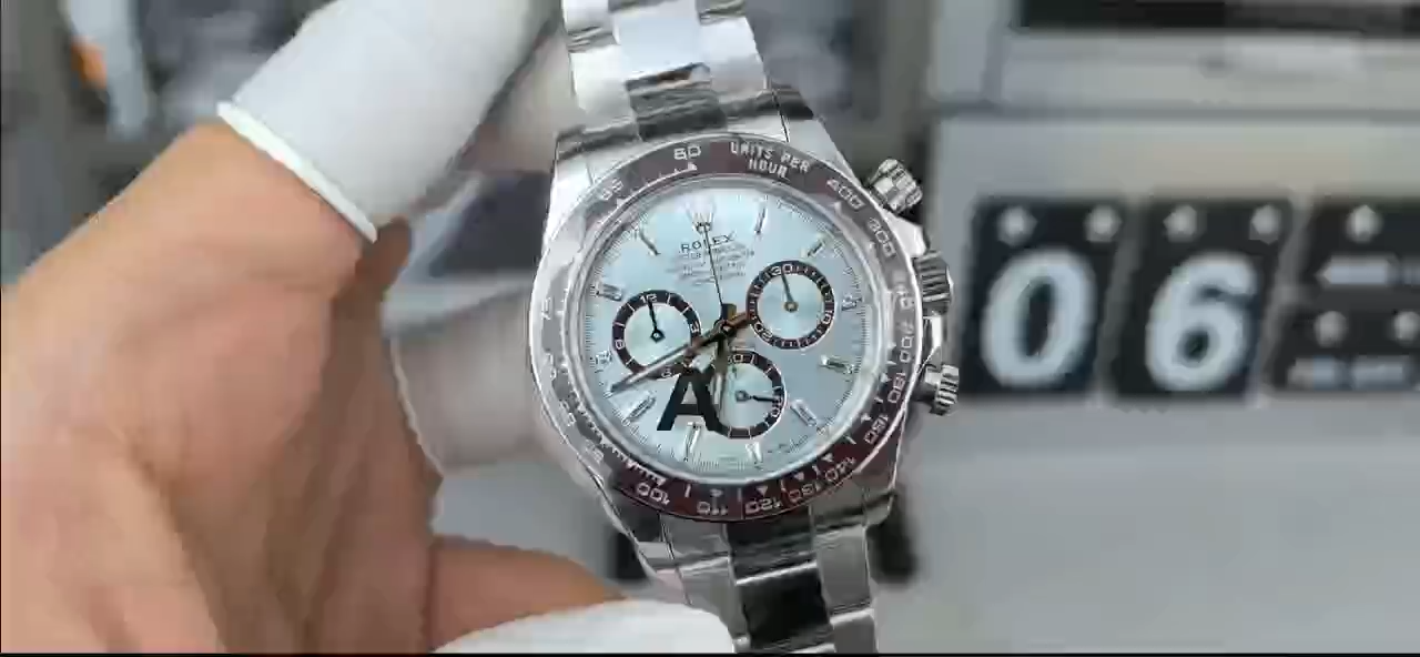 Hand-held video view of the Rolex Platinum Cosmograph Daytona 126506 0002, ice blue dial in frame.