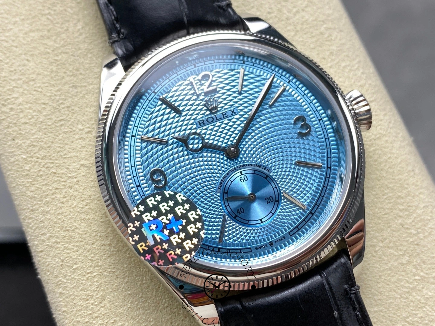 Detailed view of the Rolex 1908 52506-0003 ice blue dial with textured guilloché pattern.