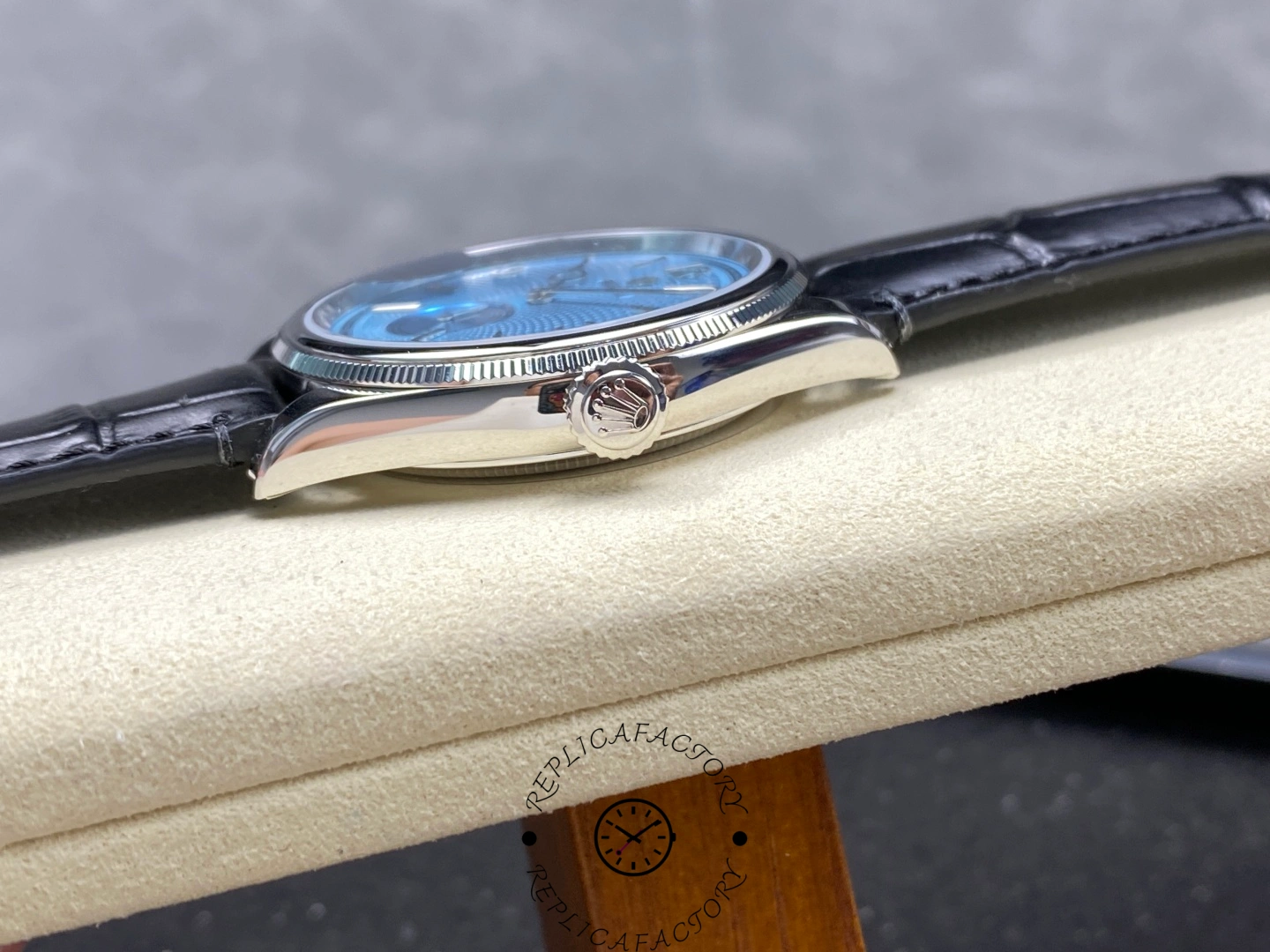 Crown-side view of the Rolex 1908 52506-0003 with signed Rolex crown and smooth case flank.