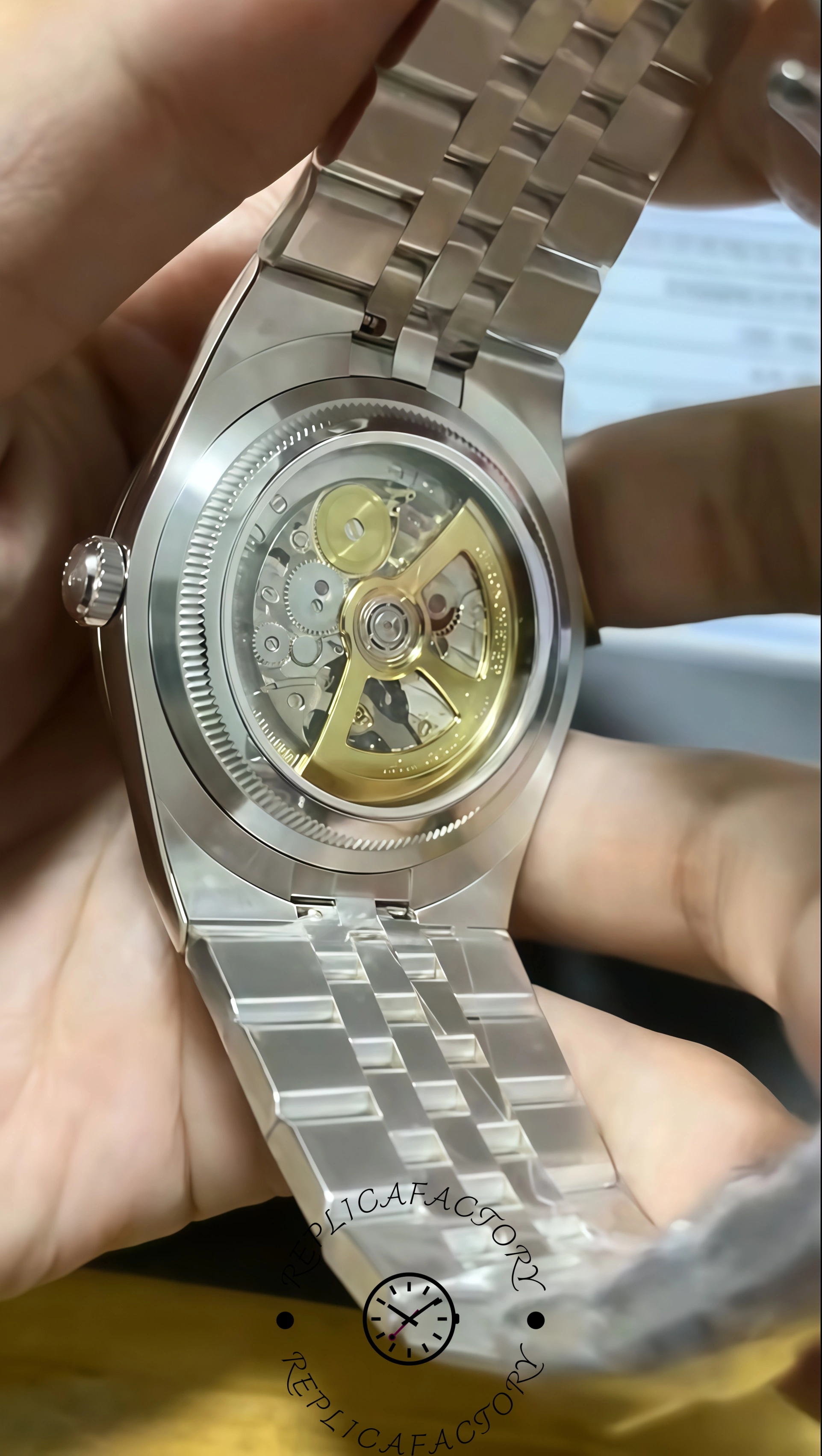 Transparent caseback view of Rolex Land-Dweller 40 127386TBR-0001 Replica revealing automatic movement.