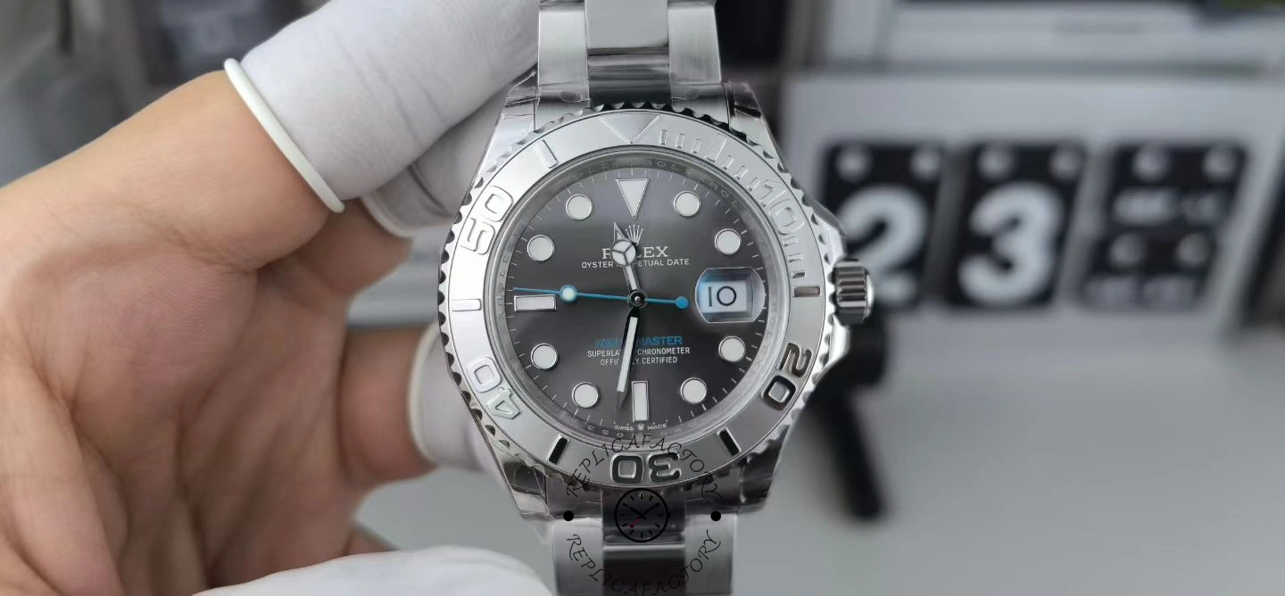 Handheld front view of the Rolex Yacht-Master 126622 with digital gauge display behind.