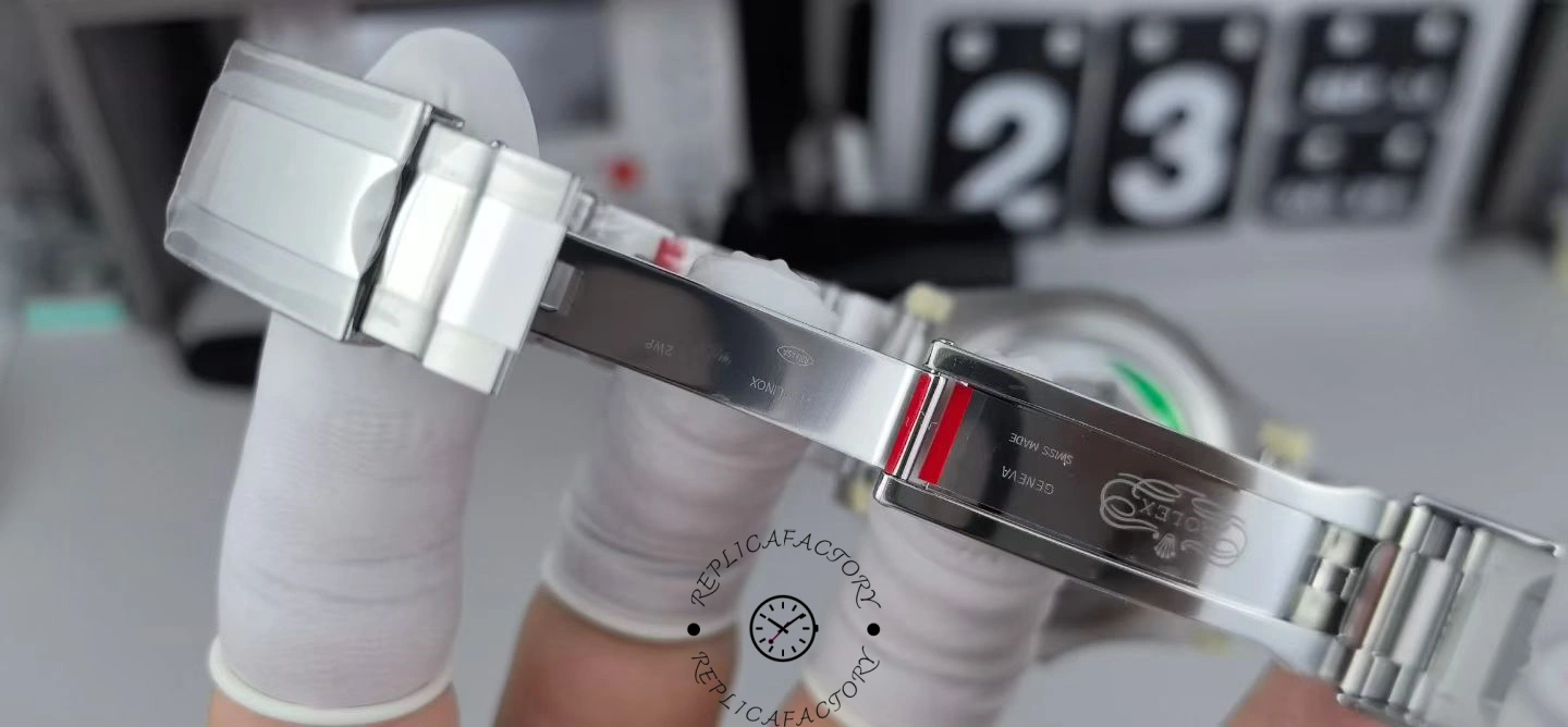 Bracelet and clasp view of the Rolex Yacht-Master 126622 shown in hand, clasp open.